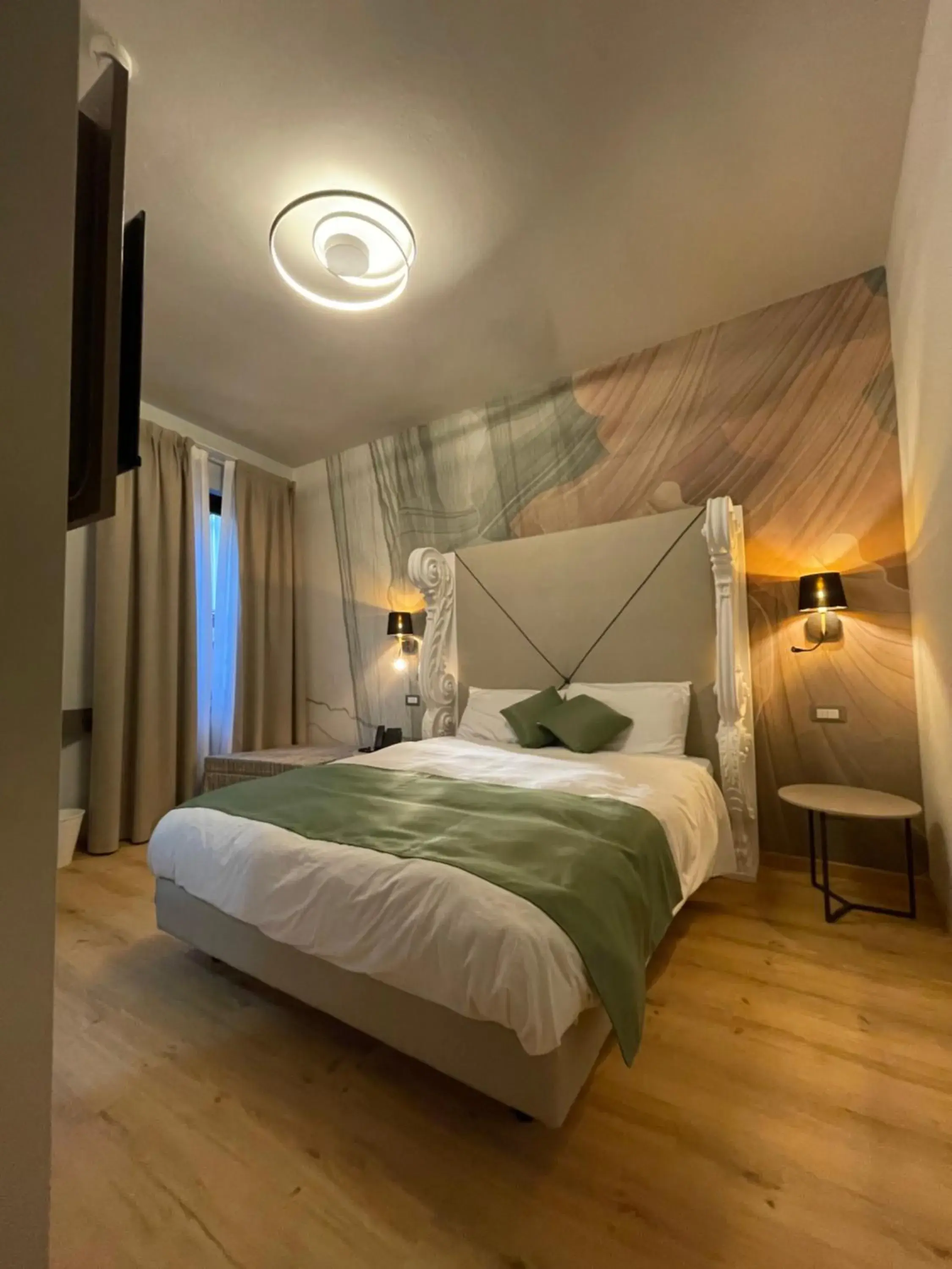 Deluxe Room (2 Adults + 1 Child) - single occupancy in Hotel Central Giacomini Deluxe Room (2 Adults + 1 Child) - single occupancy in Hotel Central Giacomini