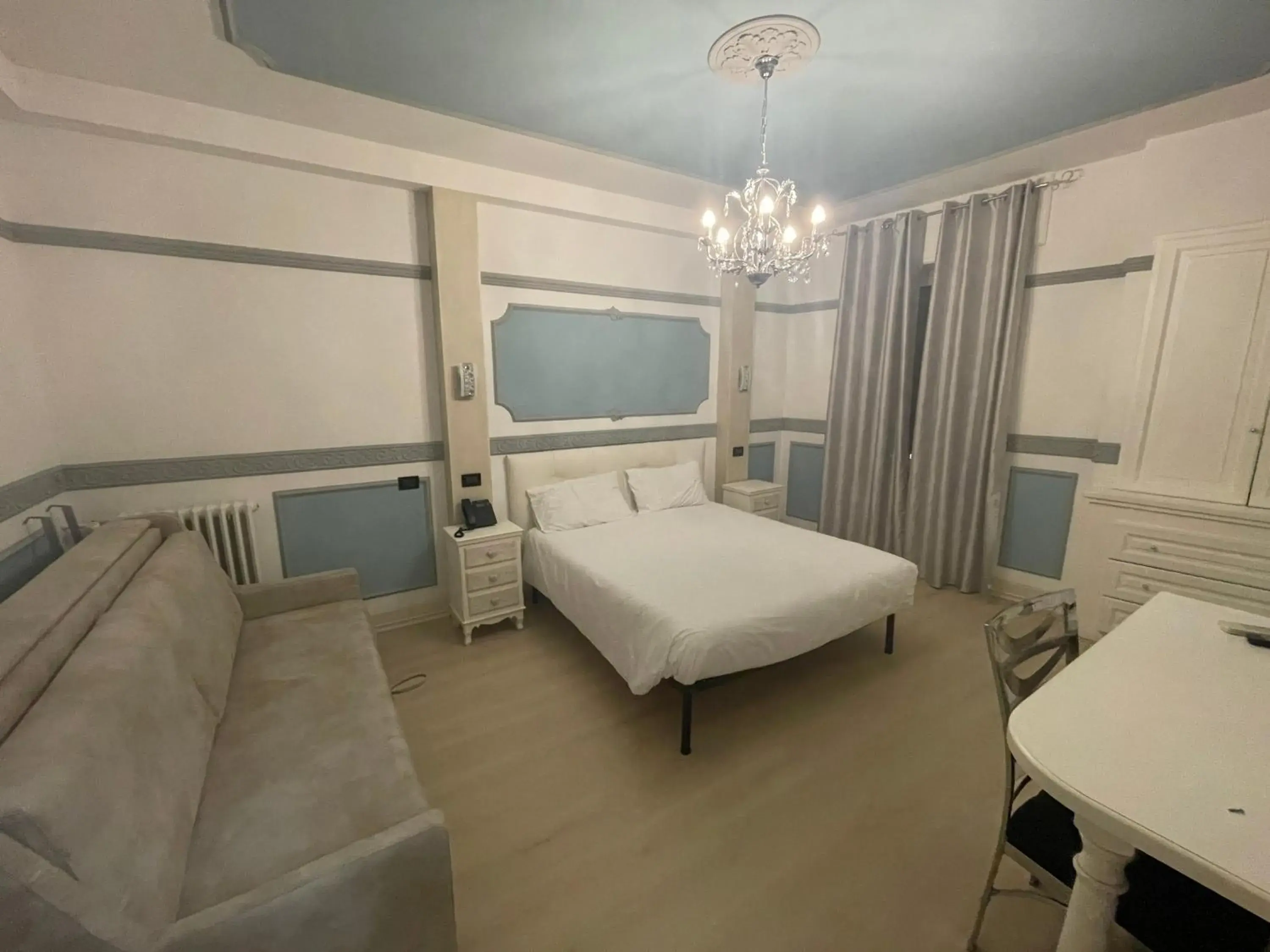 Classic Quadruple Room in Hotel Central Giacomini Classic Quadruple Room in Hotel Central Giacomini