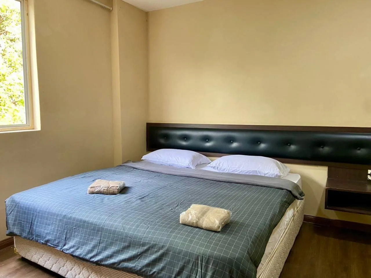 Bed in Syaz Meridien Hotel