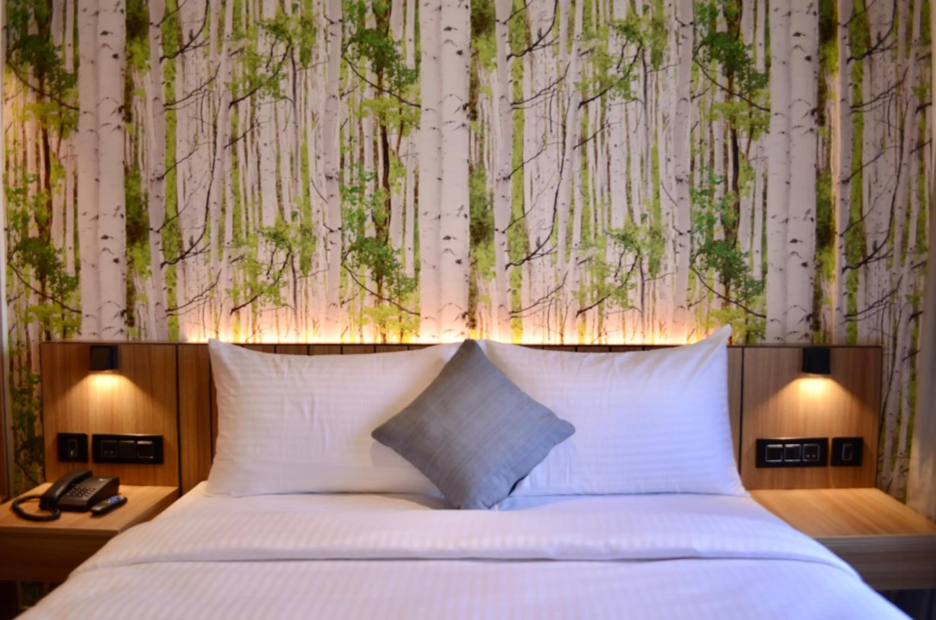 Bed in CITY LAKE HOTEL