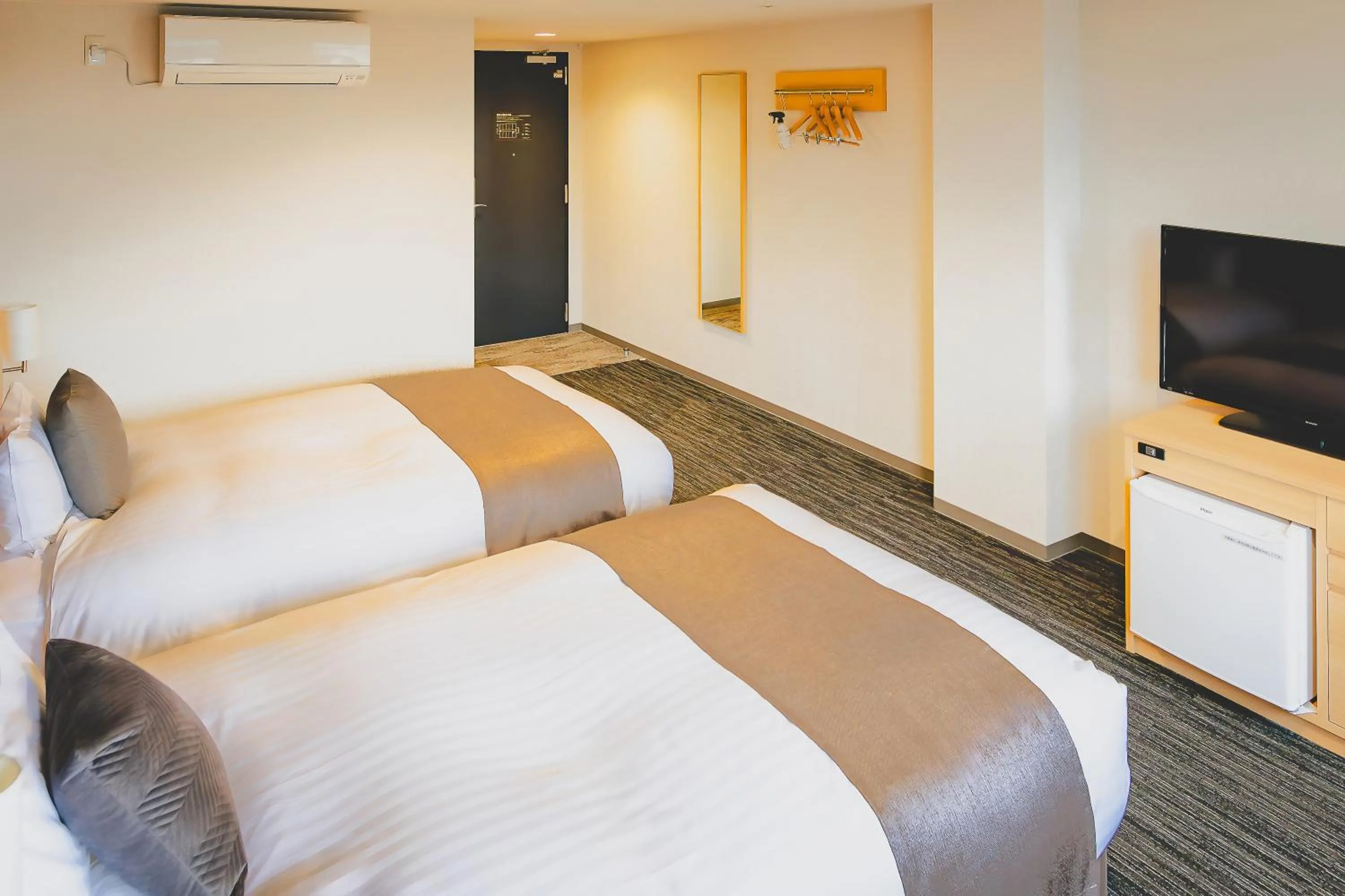 Bed in AIRAIKUHOTEL kagoshima