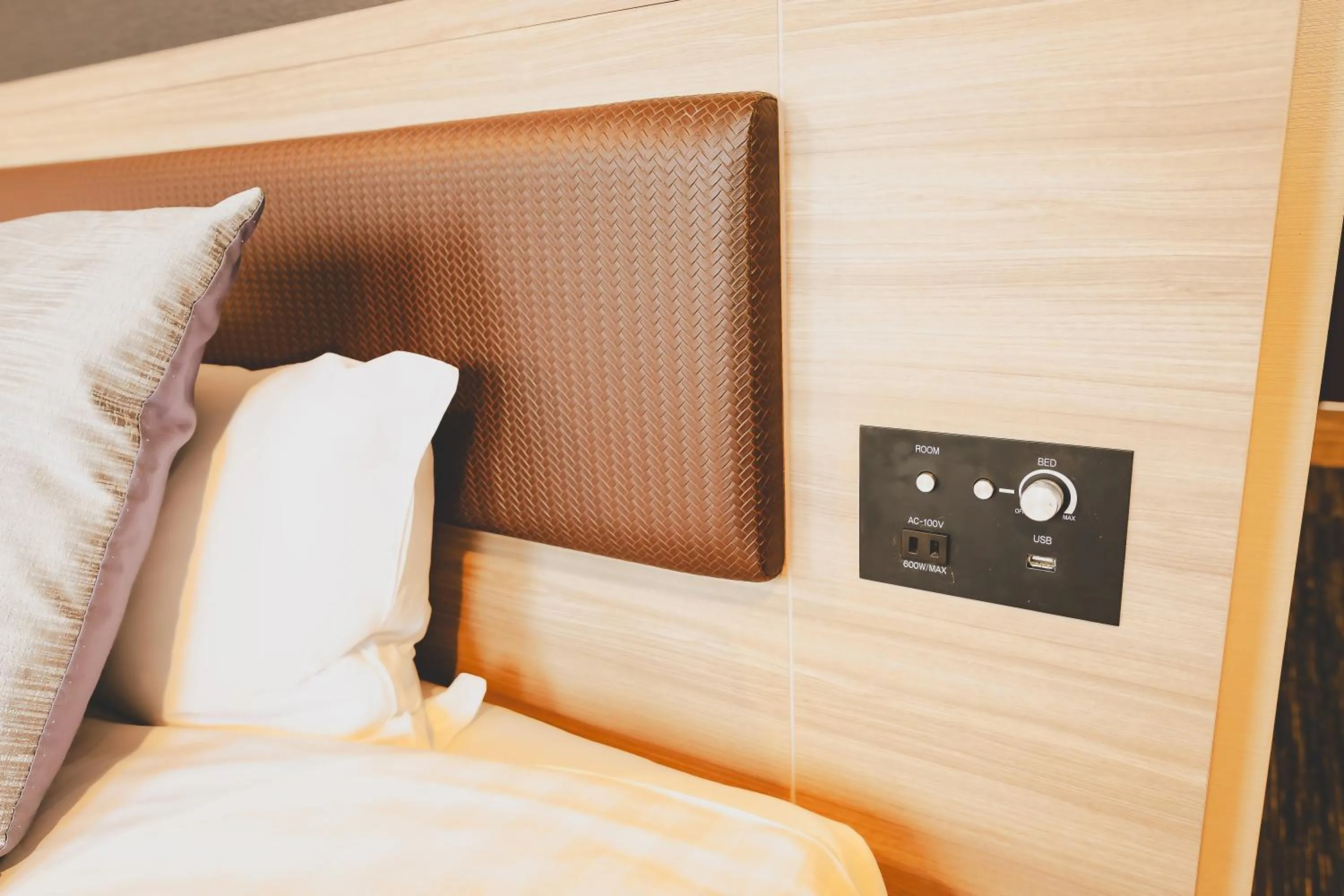 Bed in AIRAIKUHOTEL kagoshima