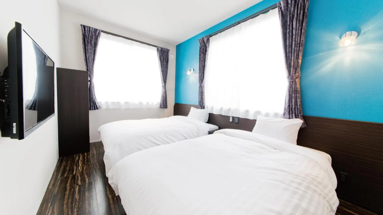 Bed in AIRAIKUHOTEL kagoshima