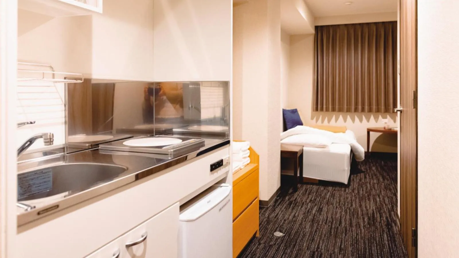 Kitchen or kitchenette in AIRAIKUHOTEL kagoshima