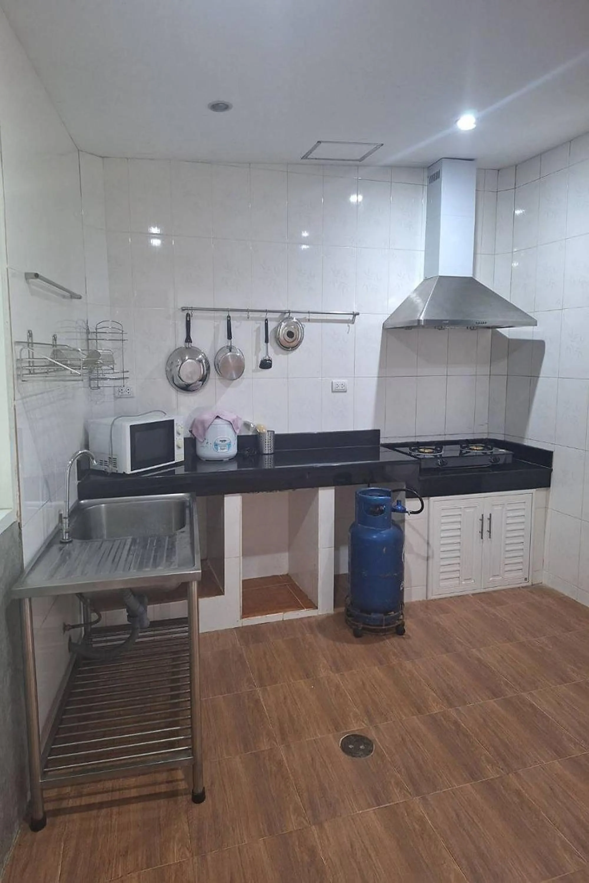 Kitchen or kitchenette in Maikhao Home Garden Bungalow