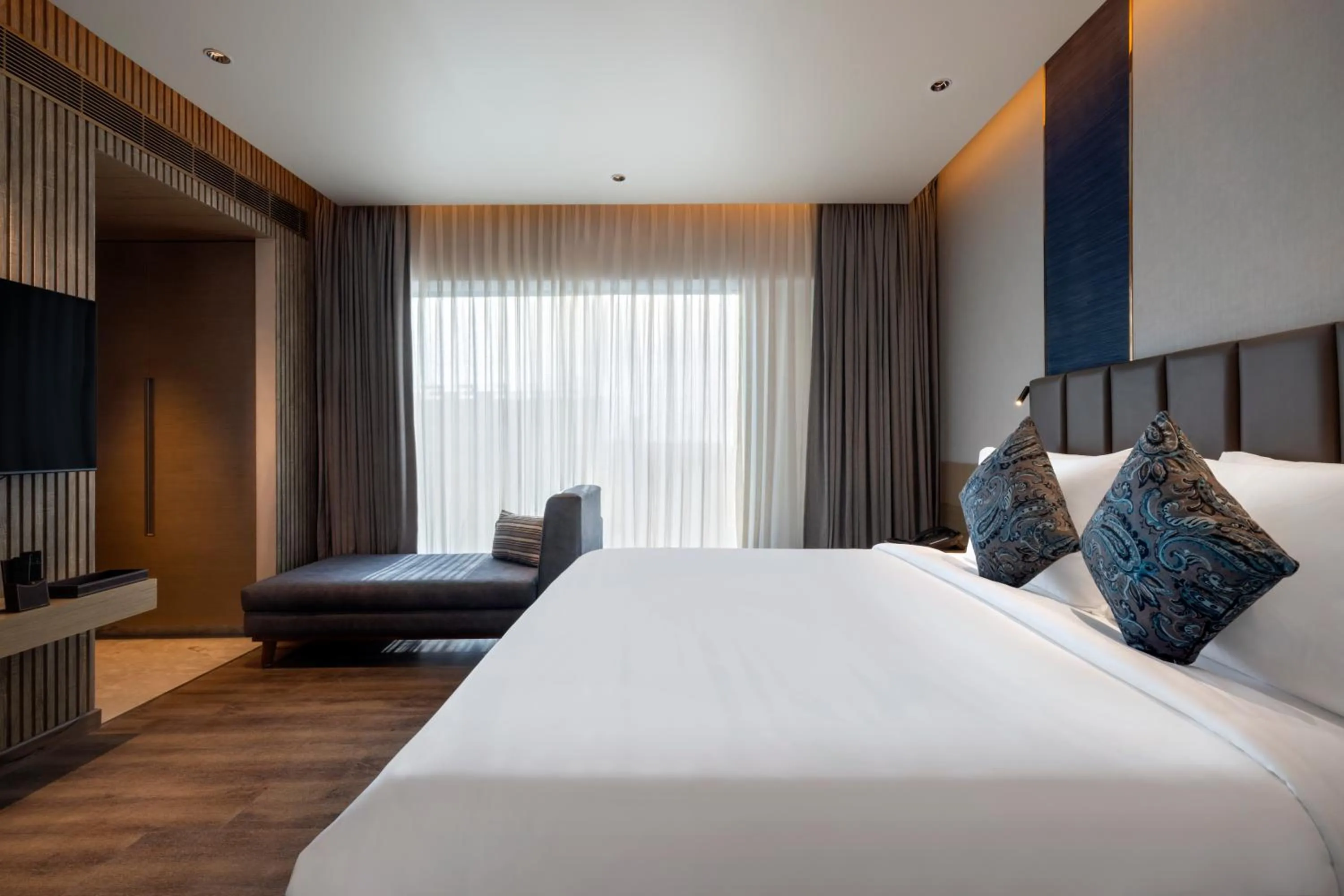 Bedroom, Bed in Grand Madurai by GRT Hotels