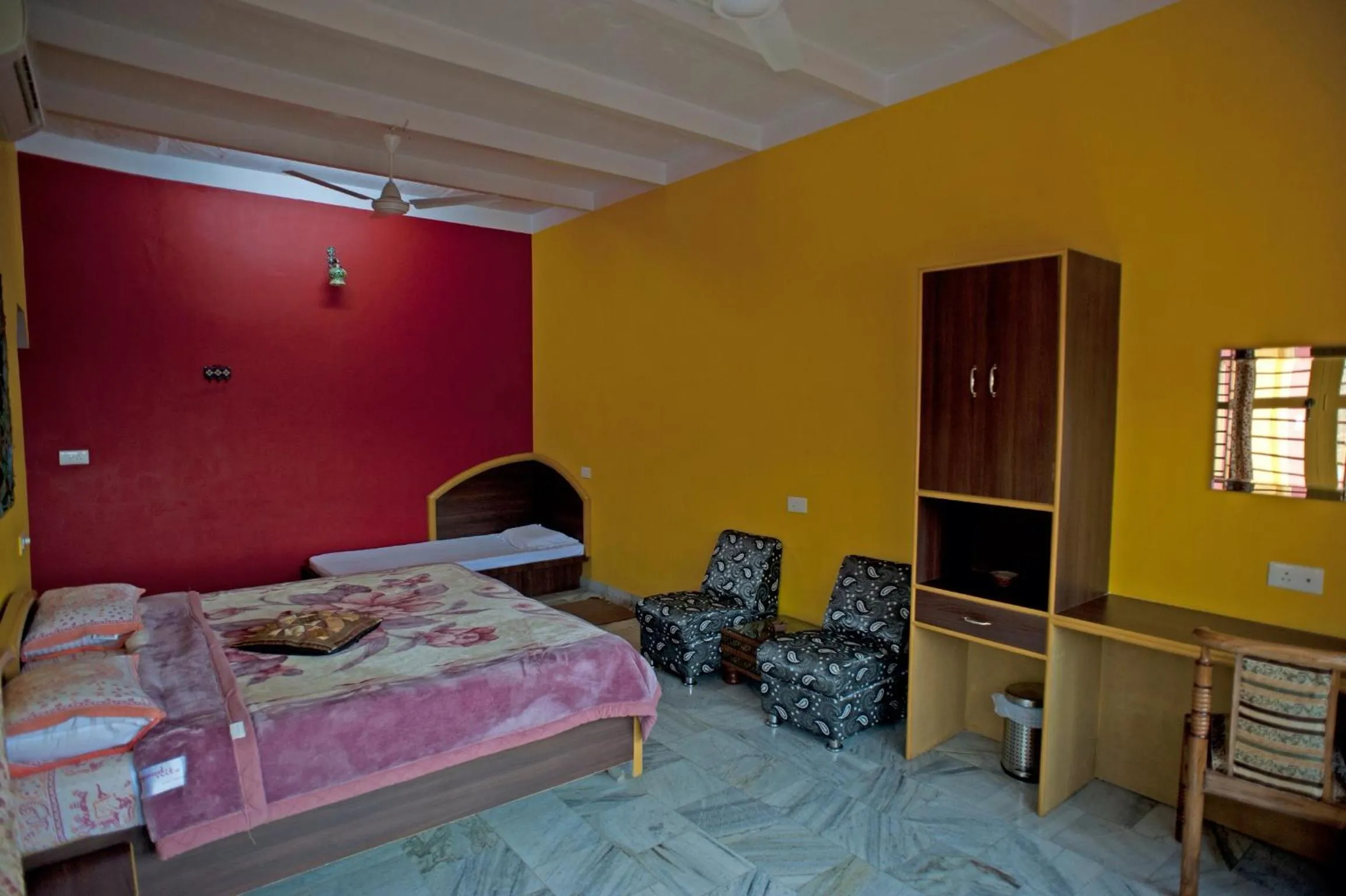 Bed in Ganpati Guest House