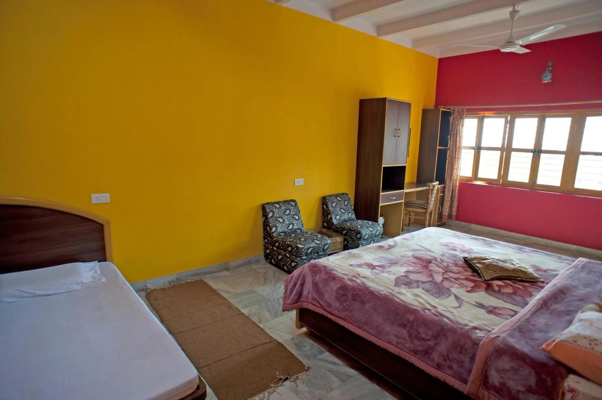 Bed in Ganpati Guest House