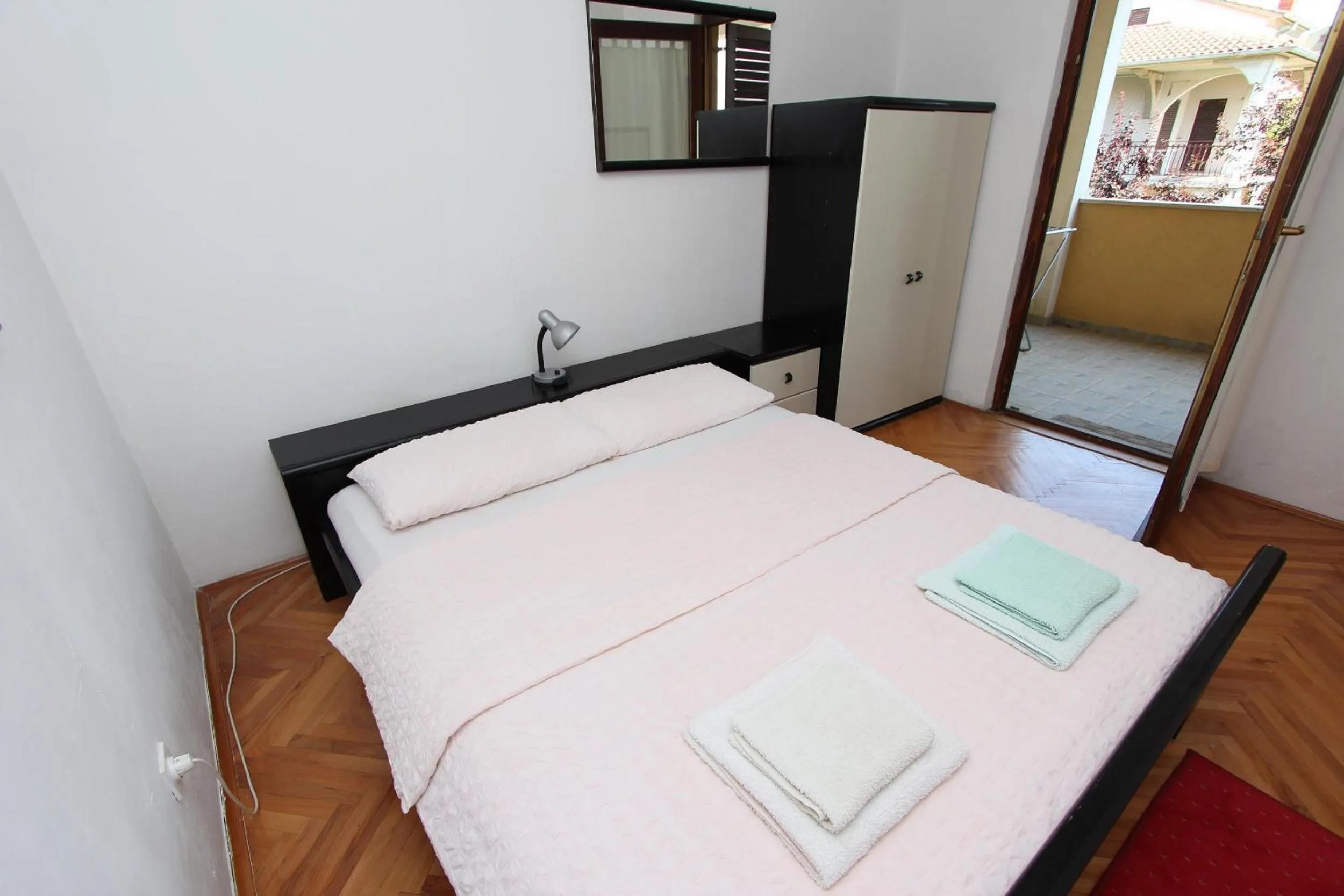 Bedroom, Bed in Apartments Lora
