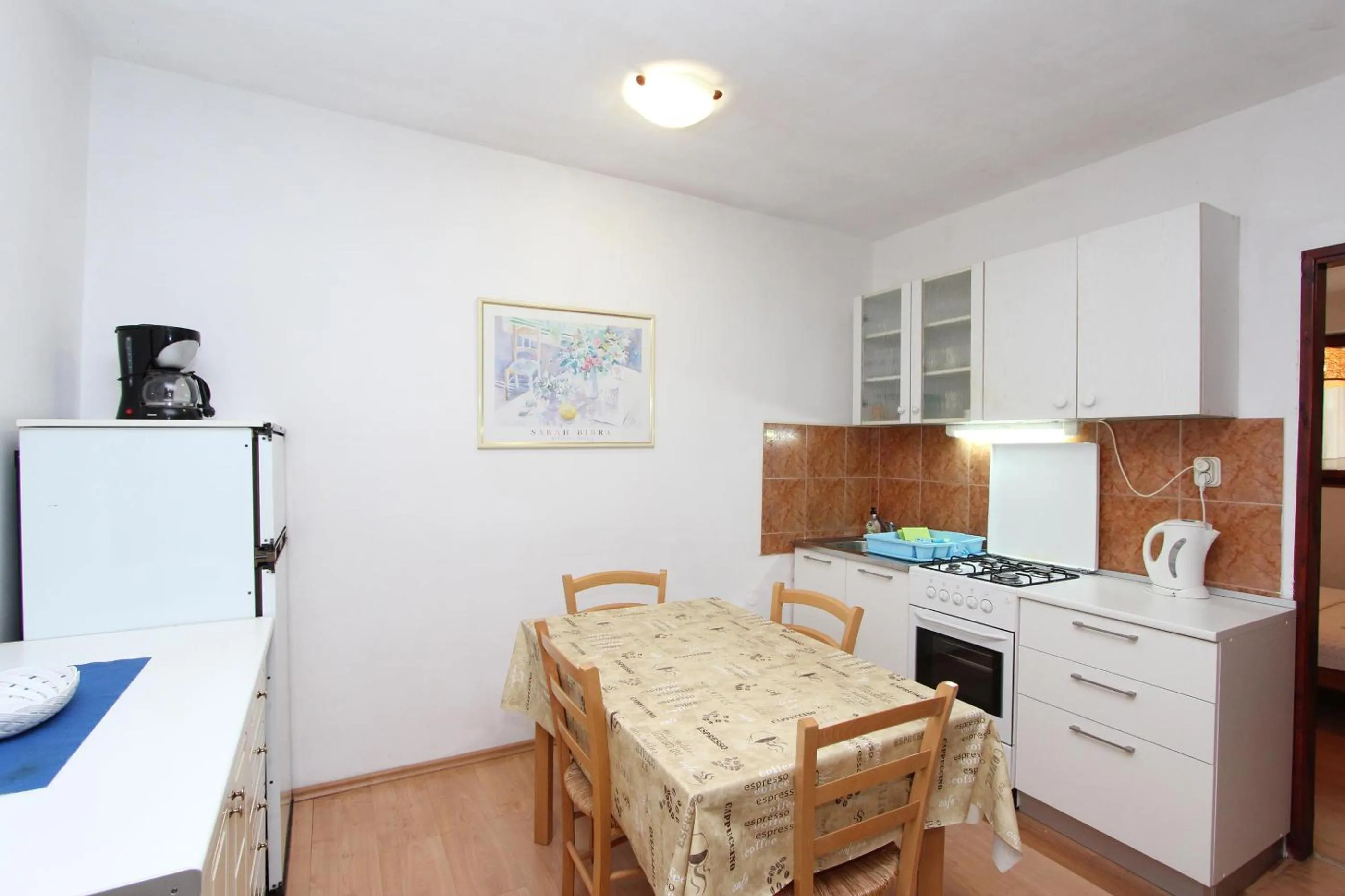 Kitchen or kitchenette in Apartments Lora