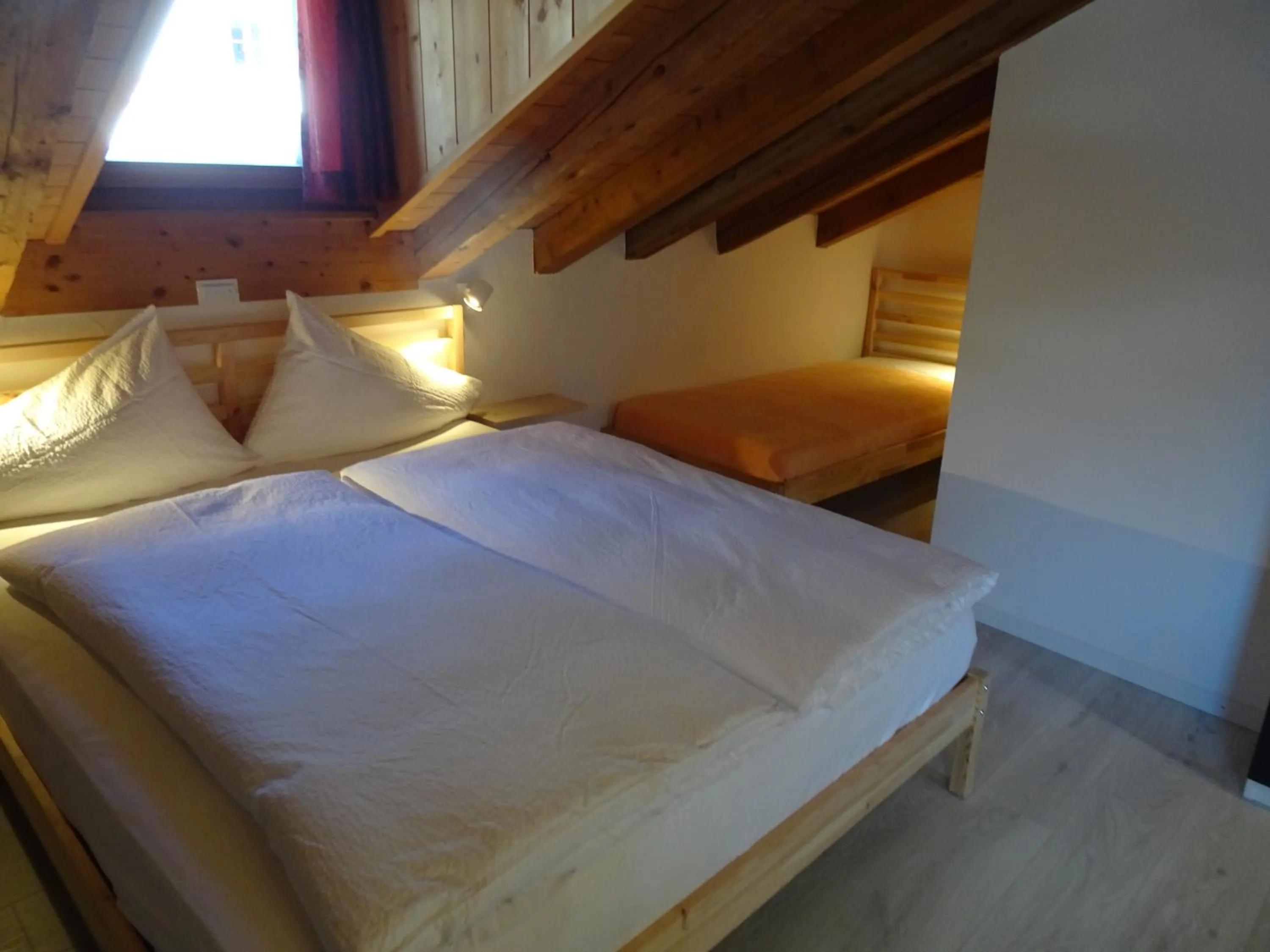 Photo of the whole room, Bed in B&B Chasa Arfusch