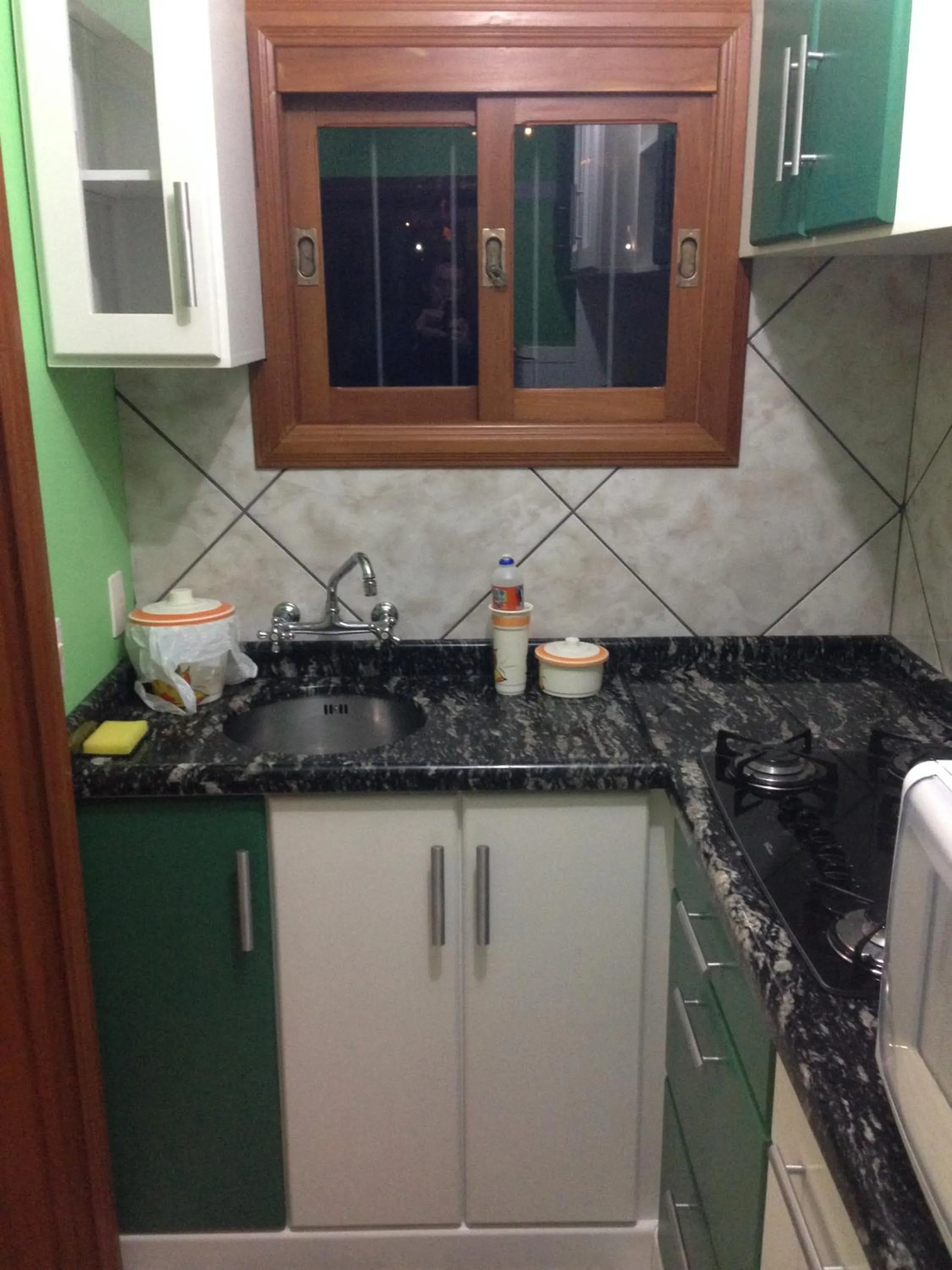 Kitchen or kitchenette in Pousada Caminho dos Plátanos