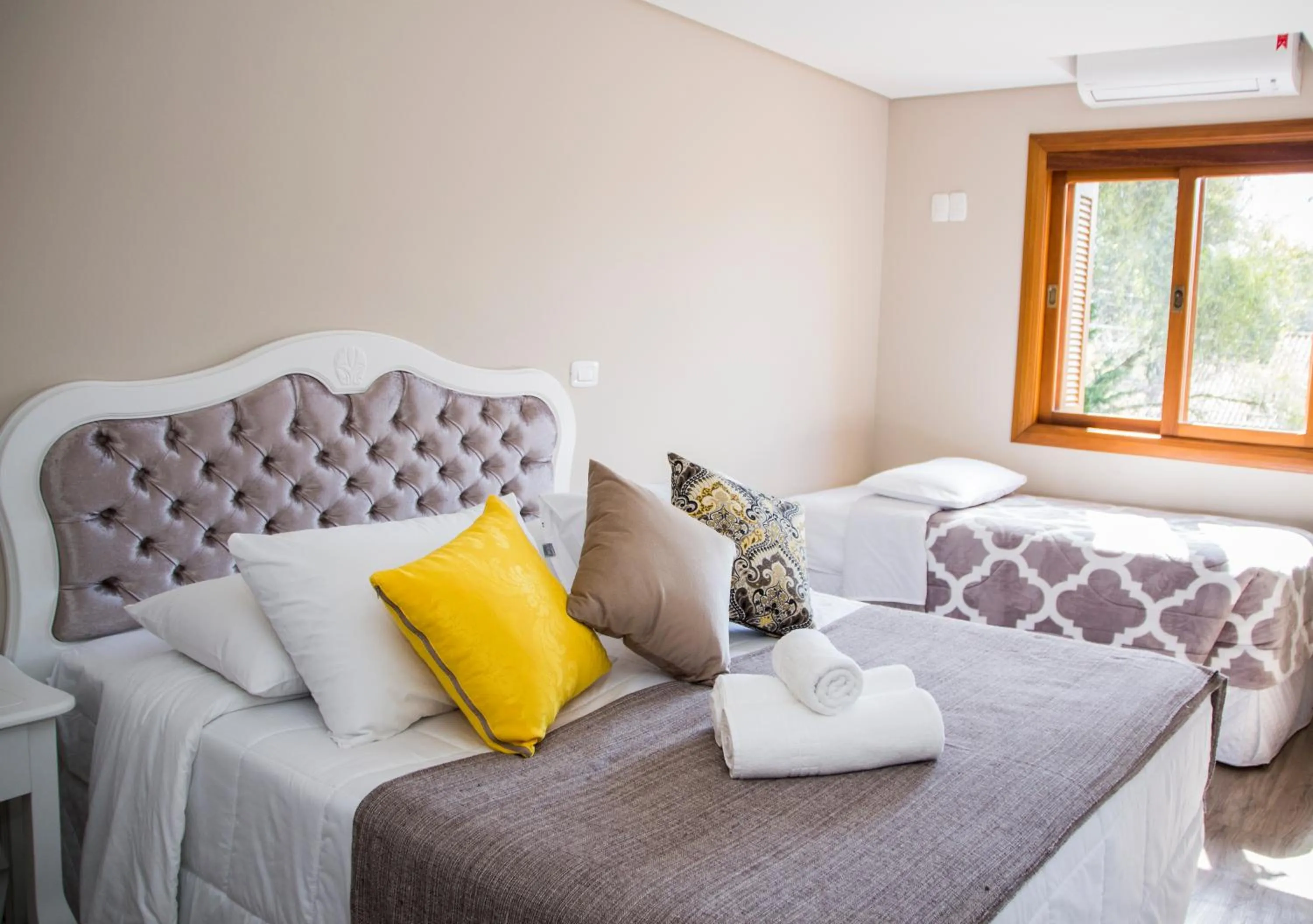 Bed in Pousada Caminho dos Plátanos