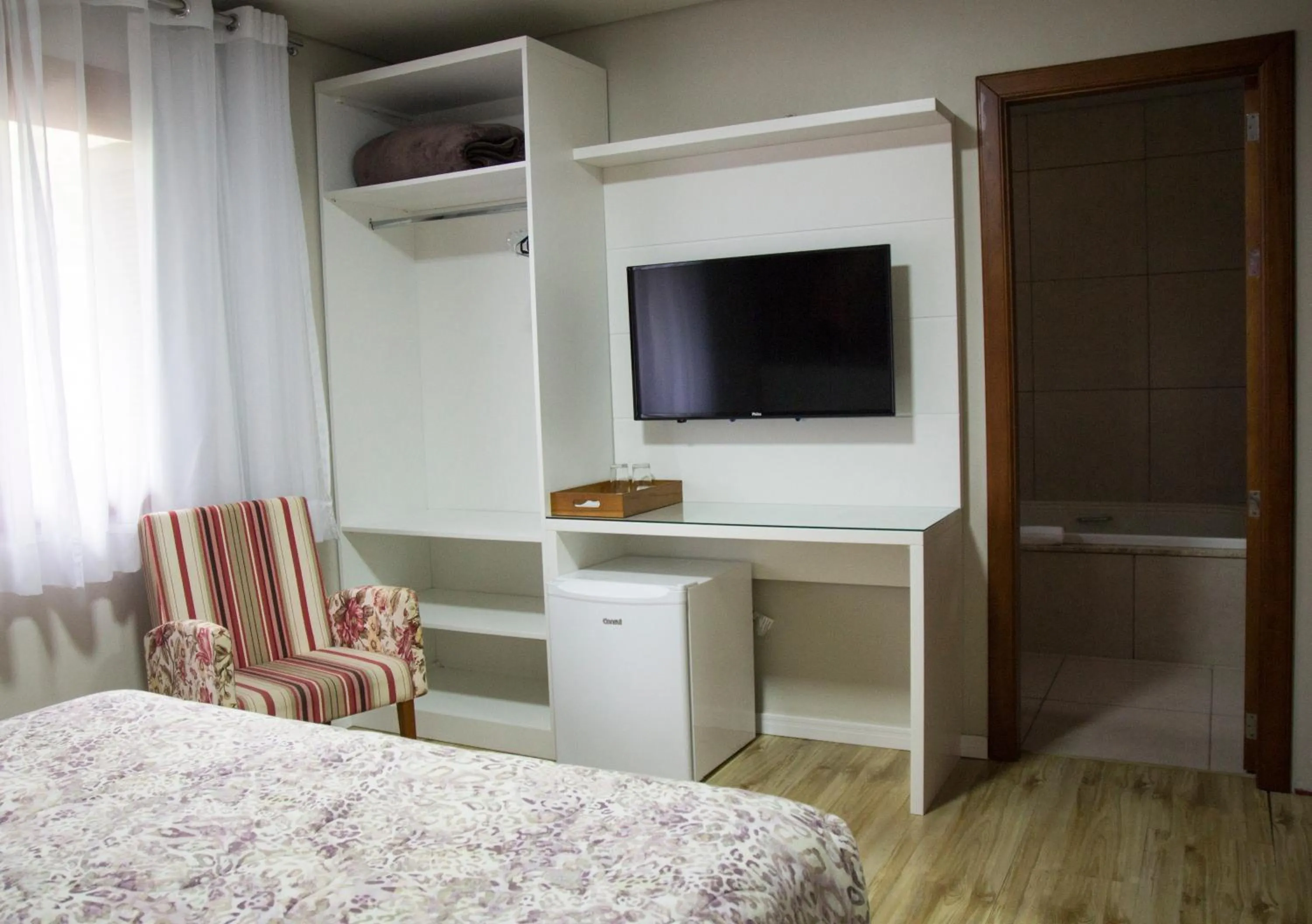 TV and multimedia, Bed in Pousada Caminho dos Plátanos