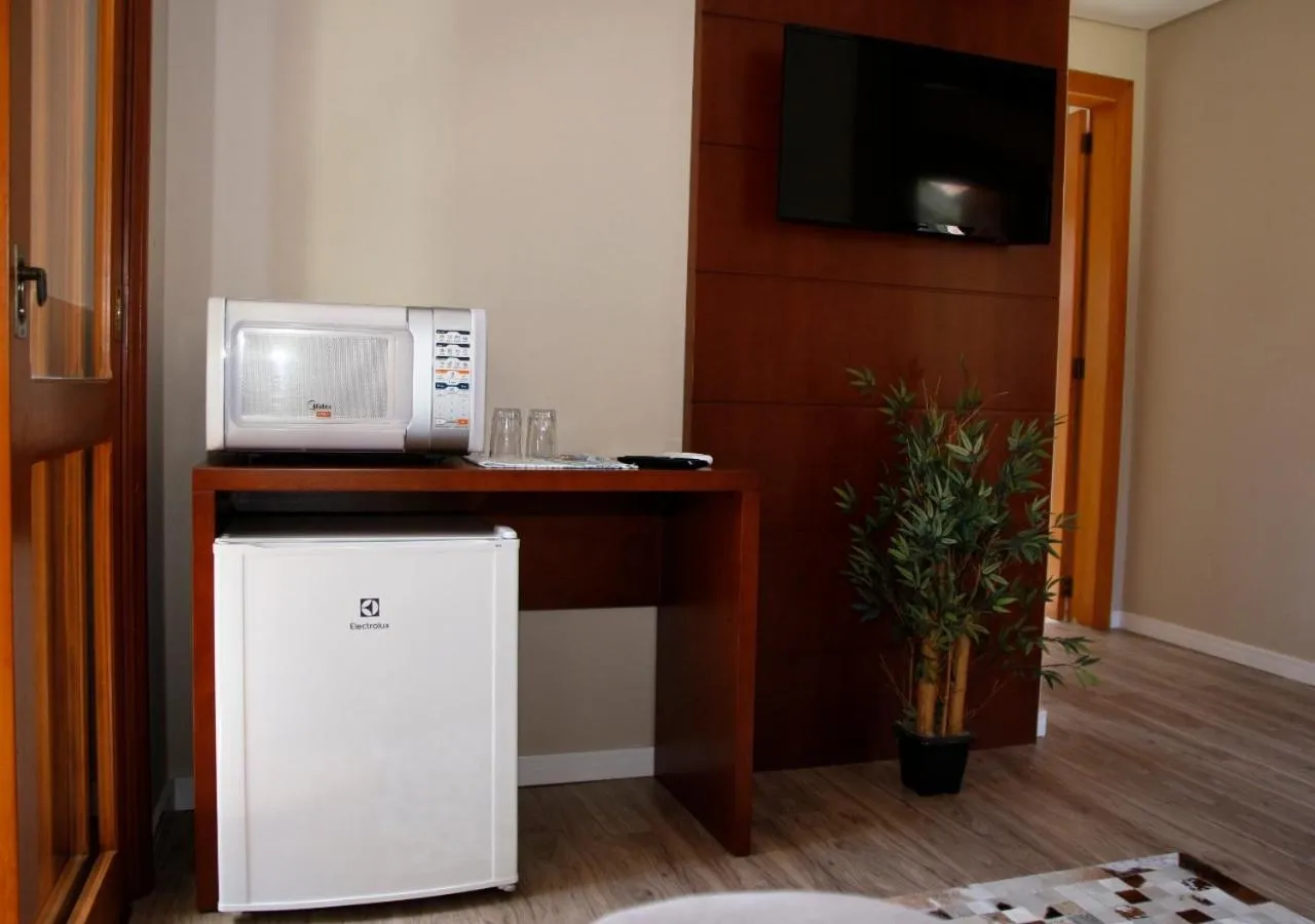 TV and multimedia in Pousada Caminho dos Plátanos