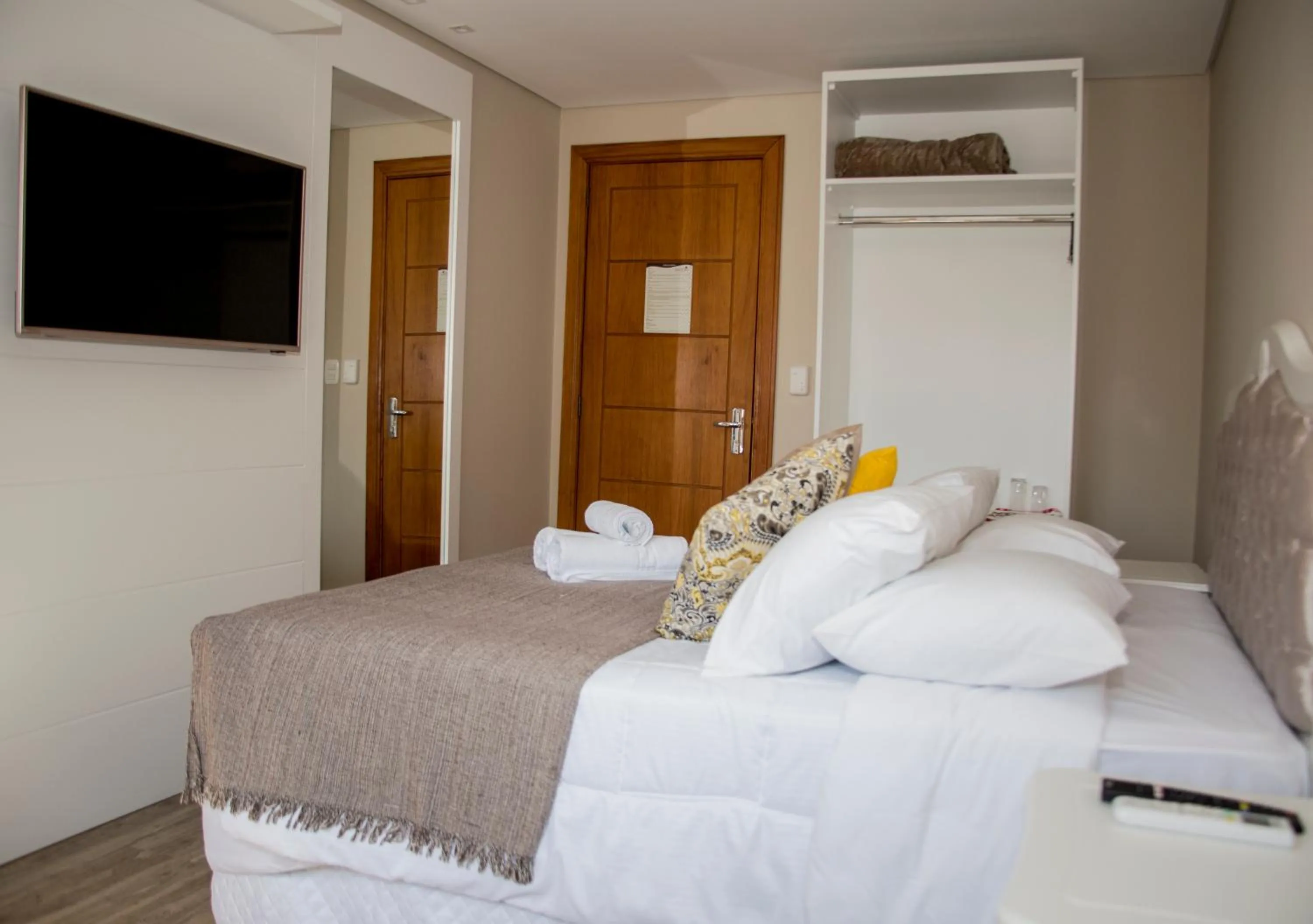 Bed in Pousada Caminho dos Plátanos