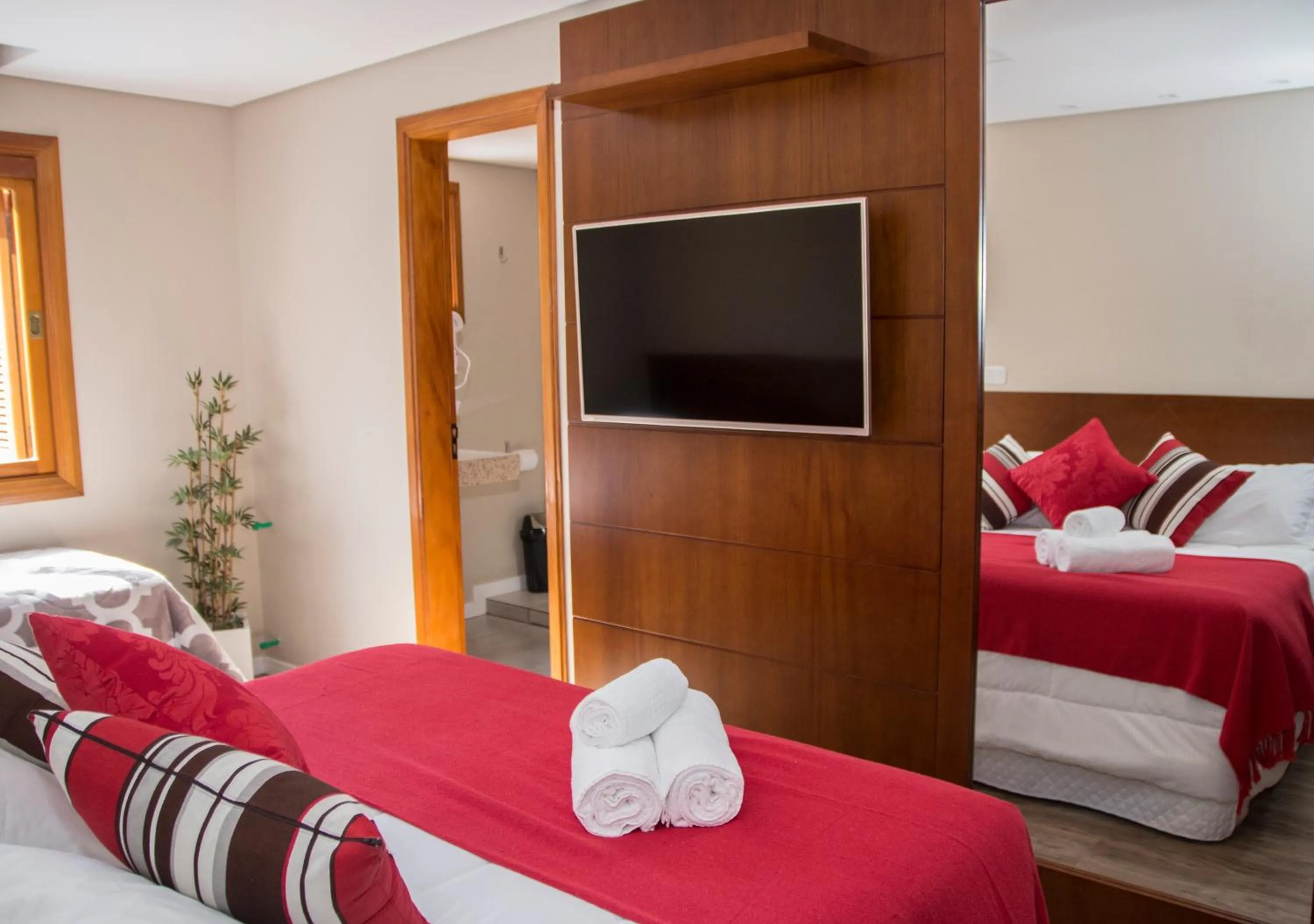 Bed in Pousada Caminho dos Plátanos