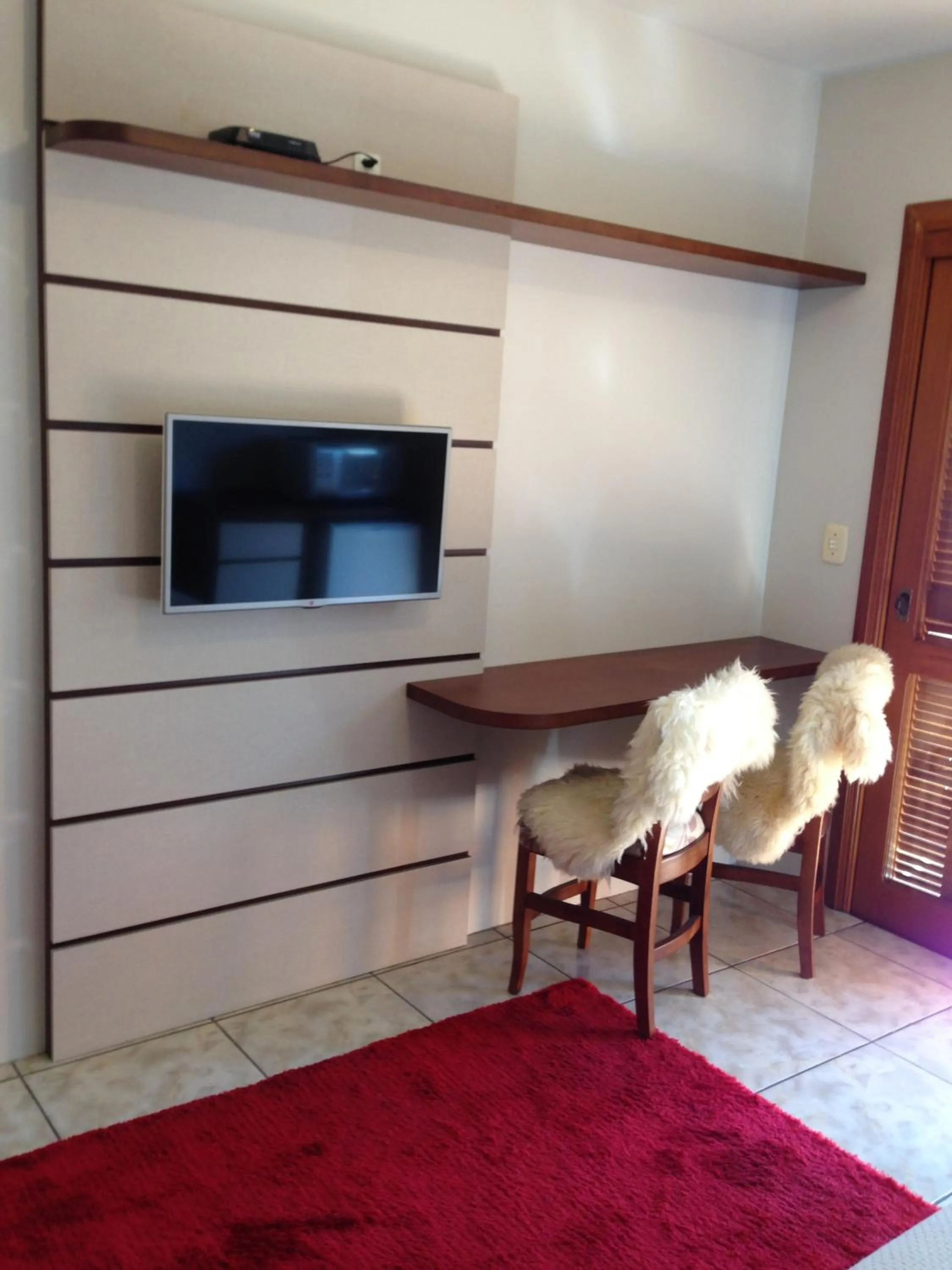 Living room in Pousada Caminho dos Plátanos