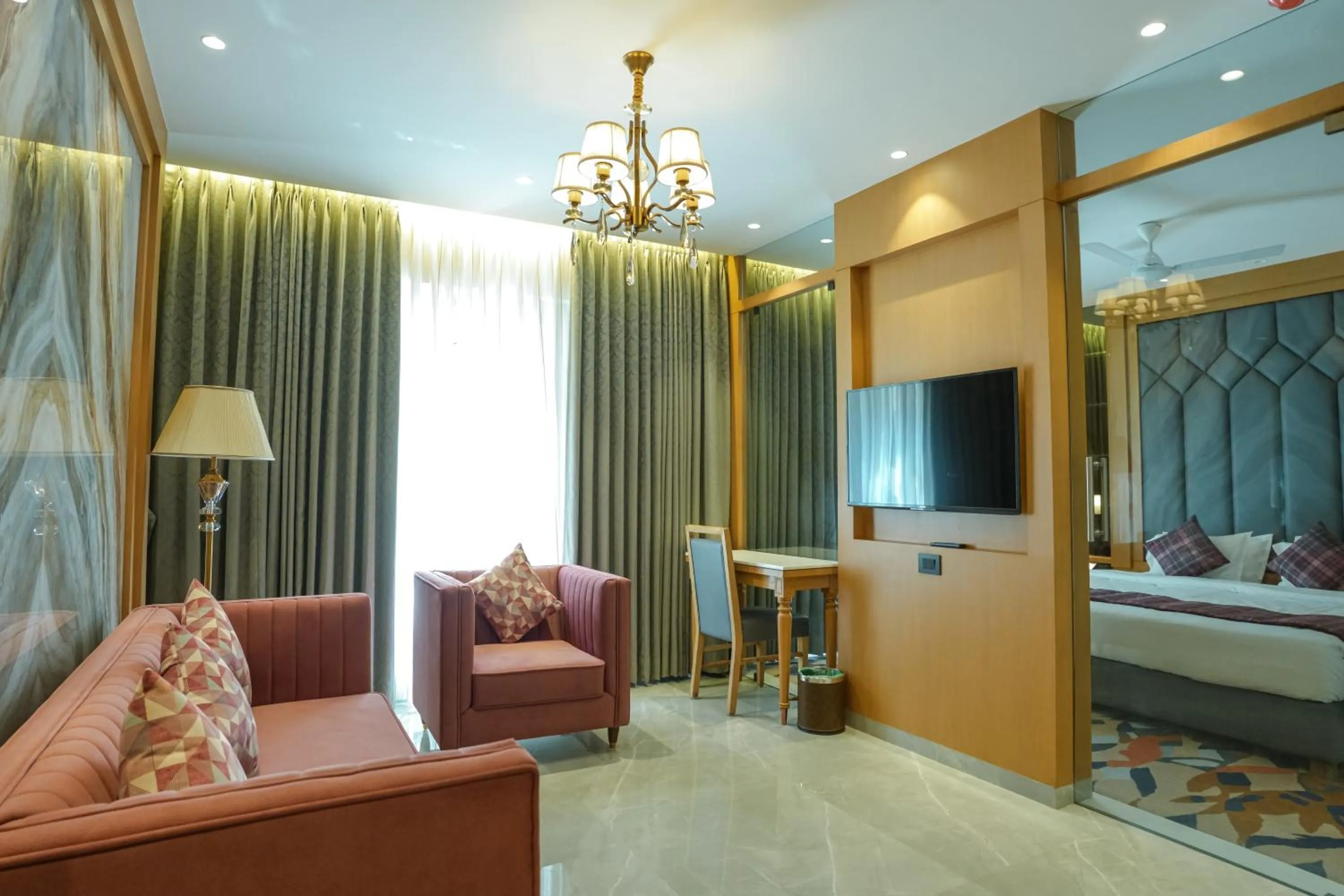 Living room, Bed in InstaFeel Hotel