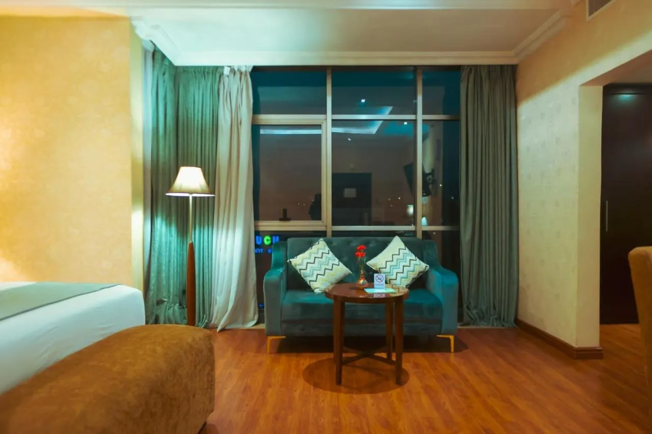 Seating area, Bed in Capital Hotel and Spa