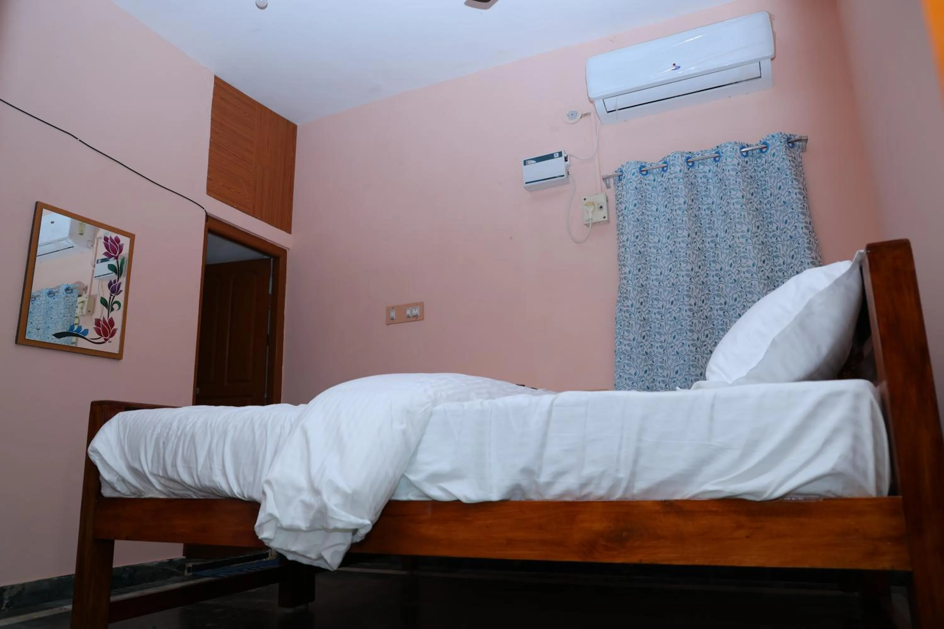 Bedroom, Bed in SS Nivas StayHome