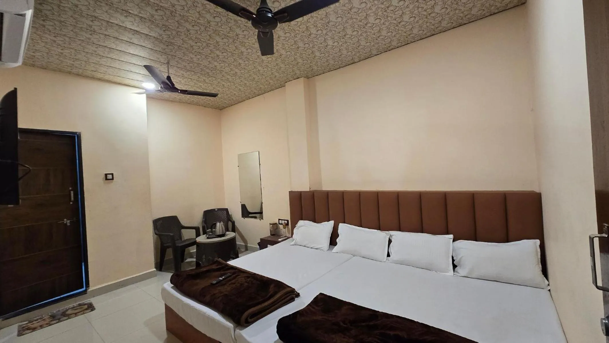 Bed in HOTEL MAHESHWARI GREEN's