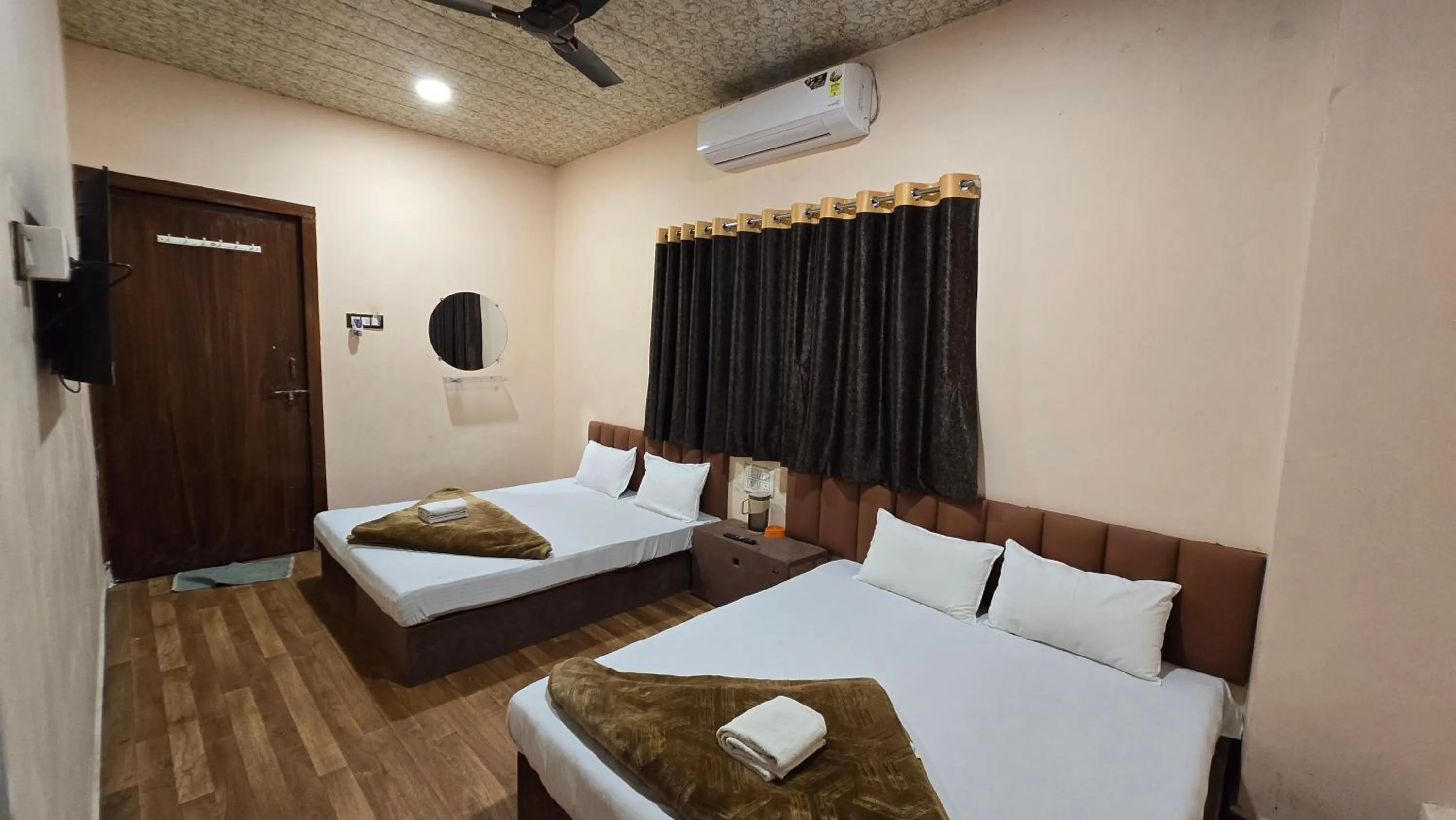 Bed in HOTEL MAHESHWARI GREEN's