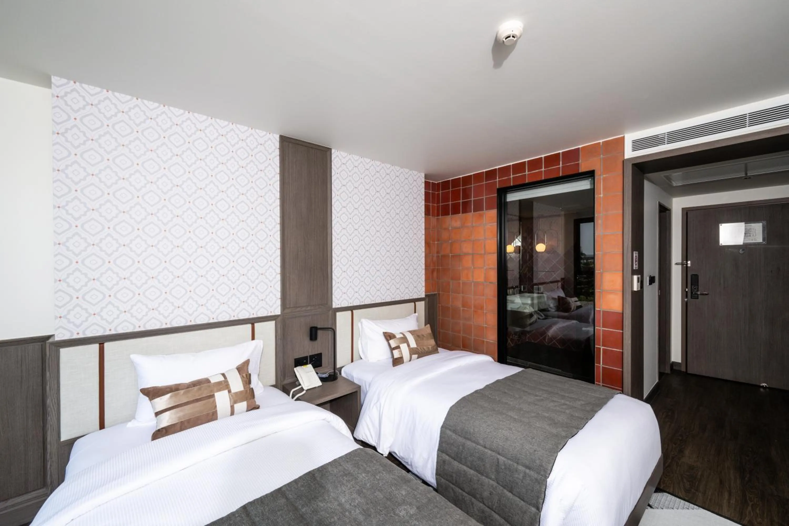 Bed in WE HOTEL RIVERFRONT