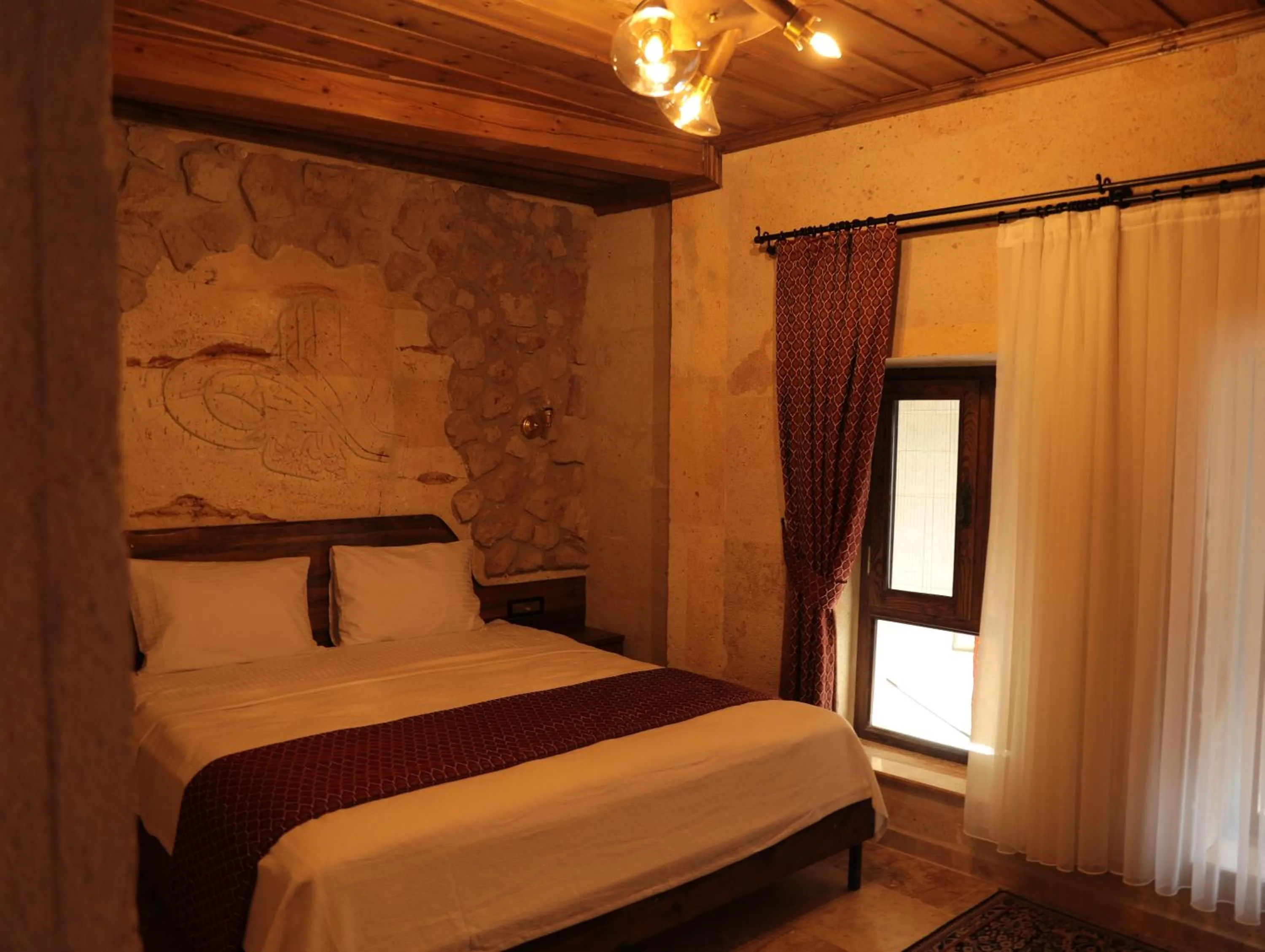 Bed in Hira Cave Hotel