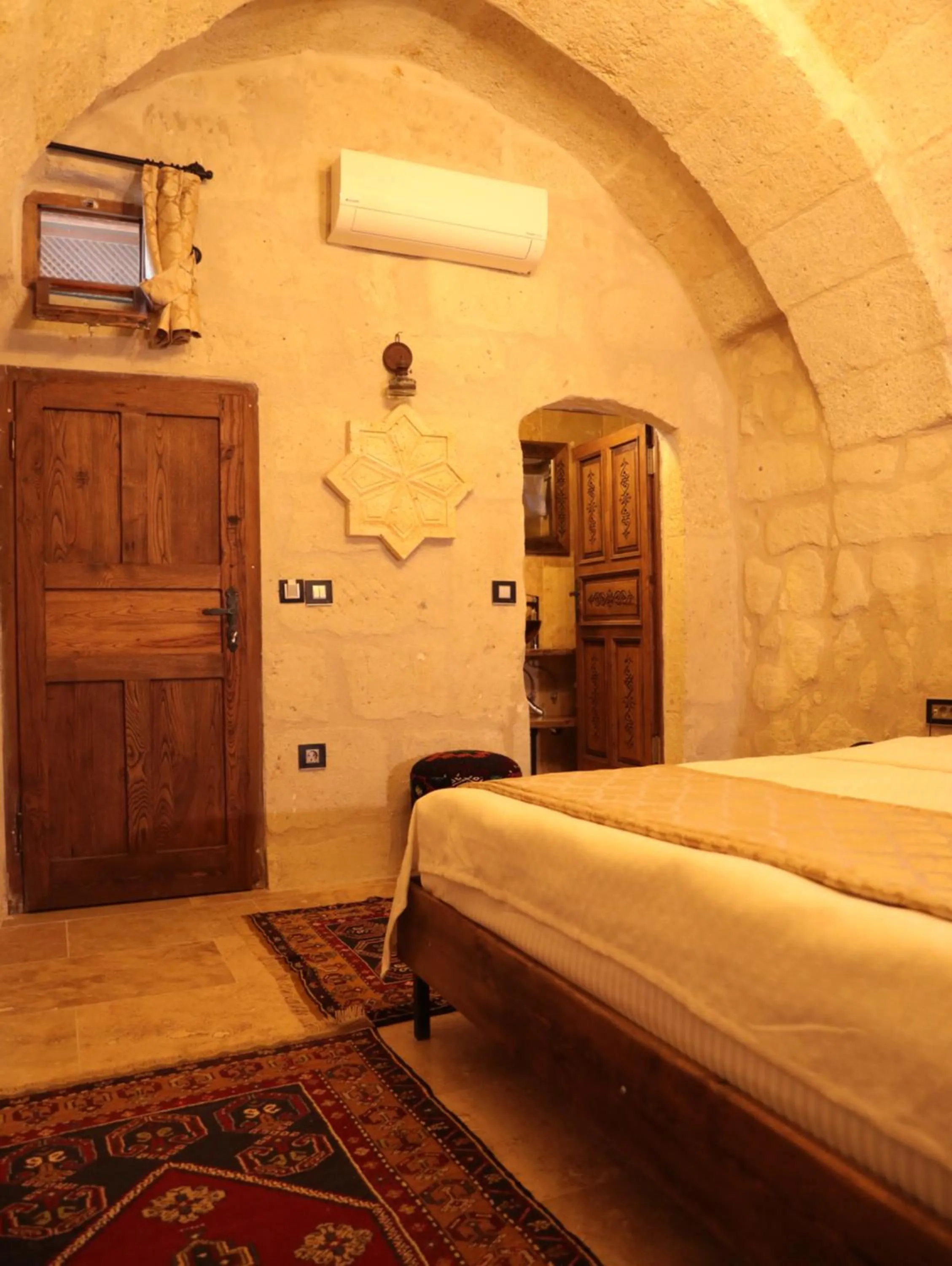 Bed in Hira Cave Hotel