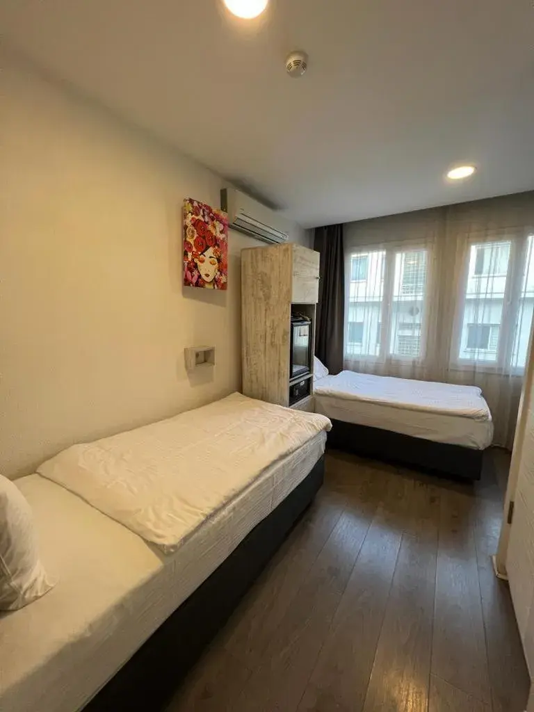 Twin Room in Piano Hotel Twin Room in Piano Hotel