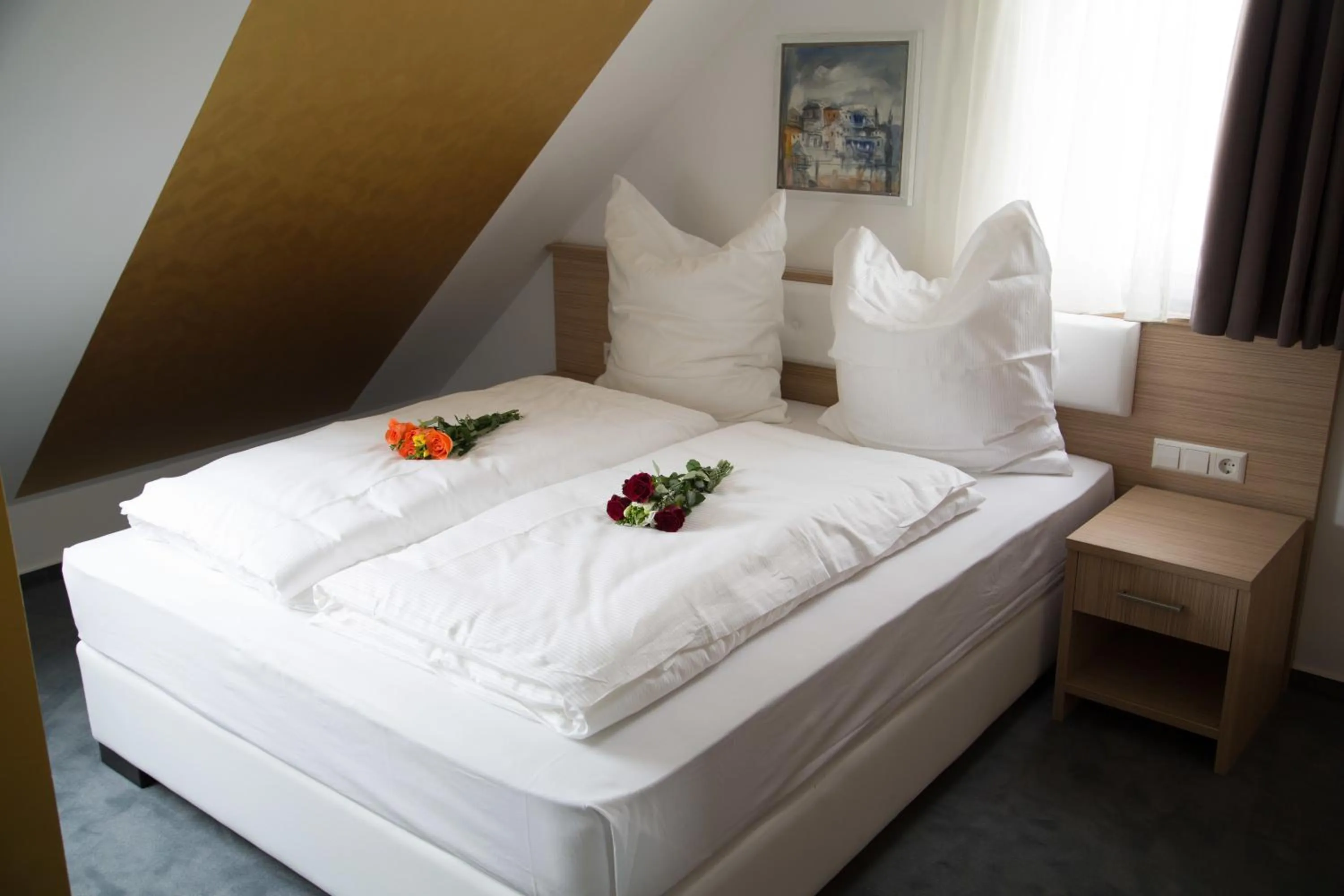 Bed in Alpha & Omega Hotel Stuttgart
