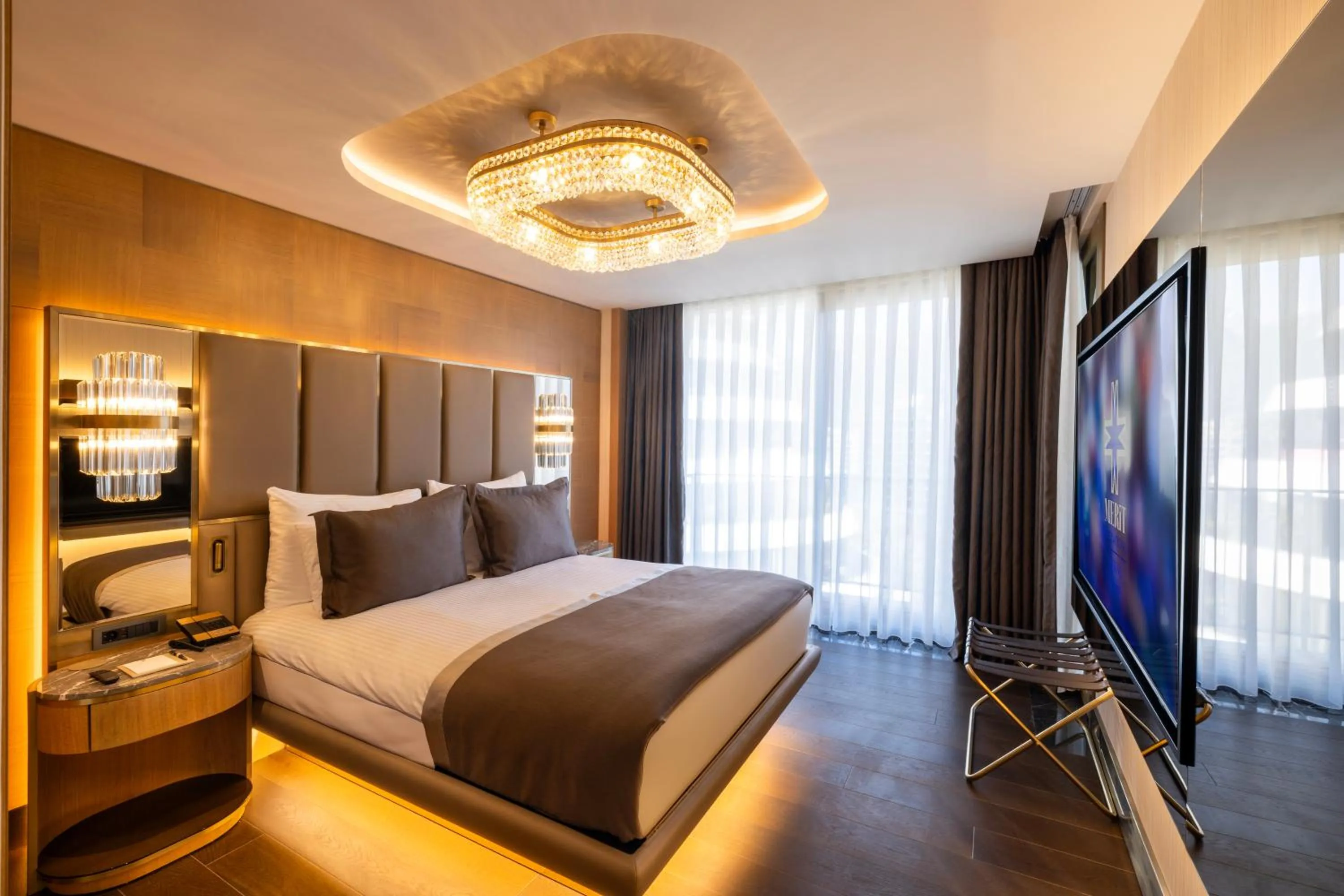 Bed in Merit Starlit Hotel & Residences