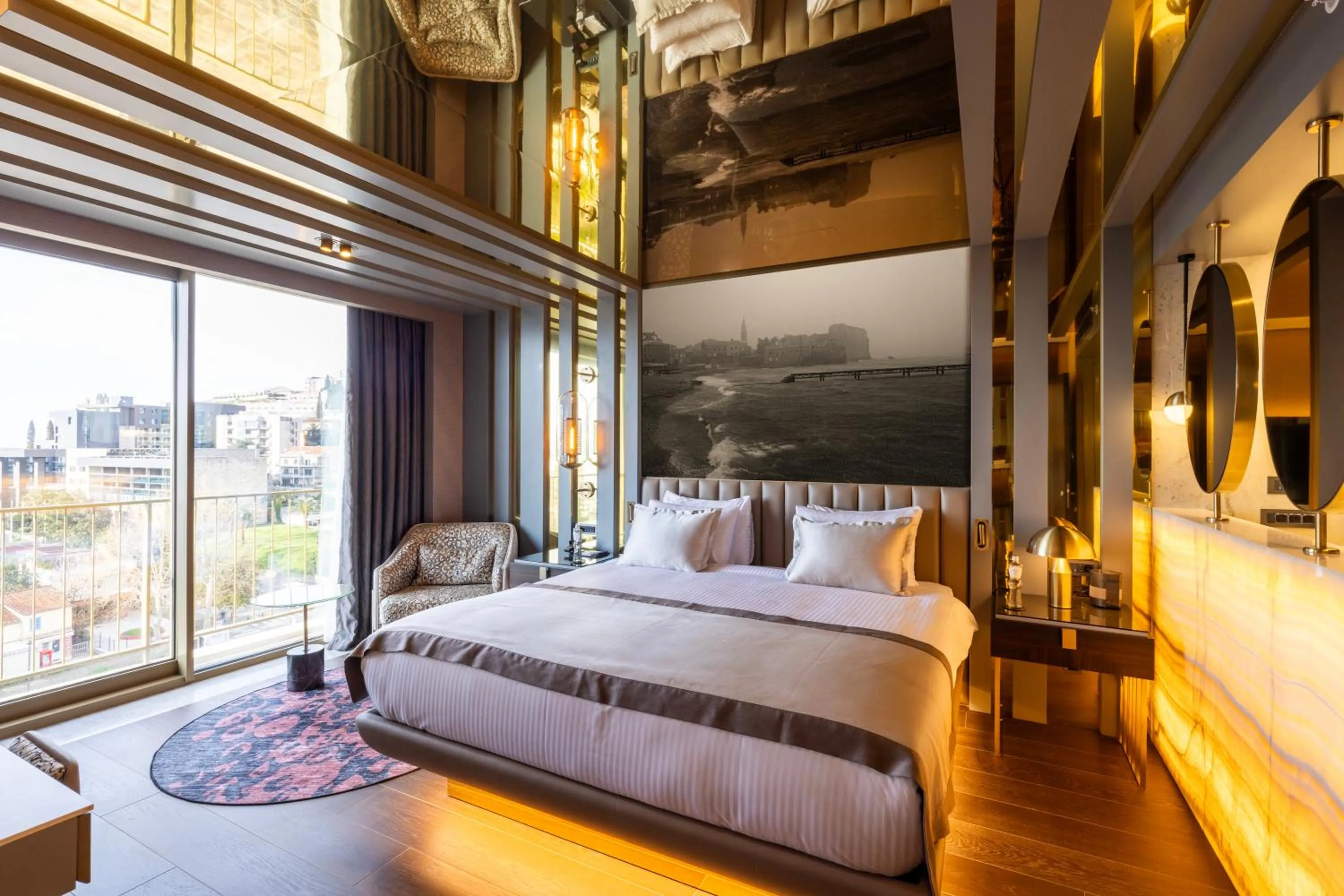 Bed in Merit Starlit Hotel & Residences