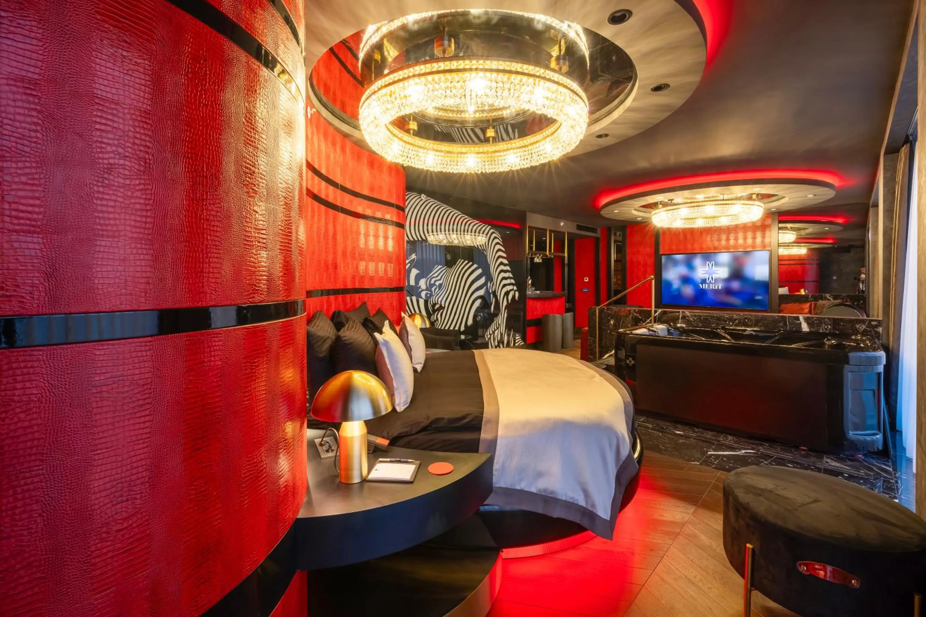 Bed in Merit Starlit Hotel & Residences