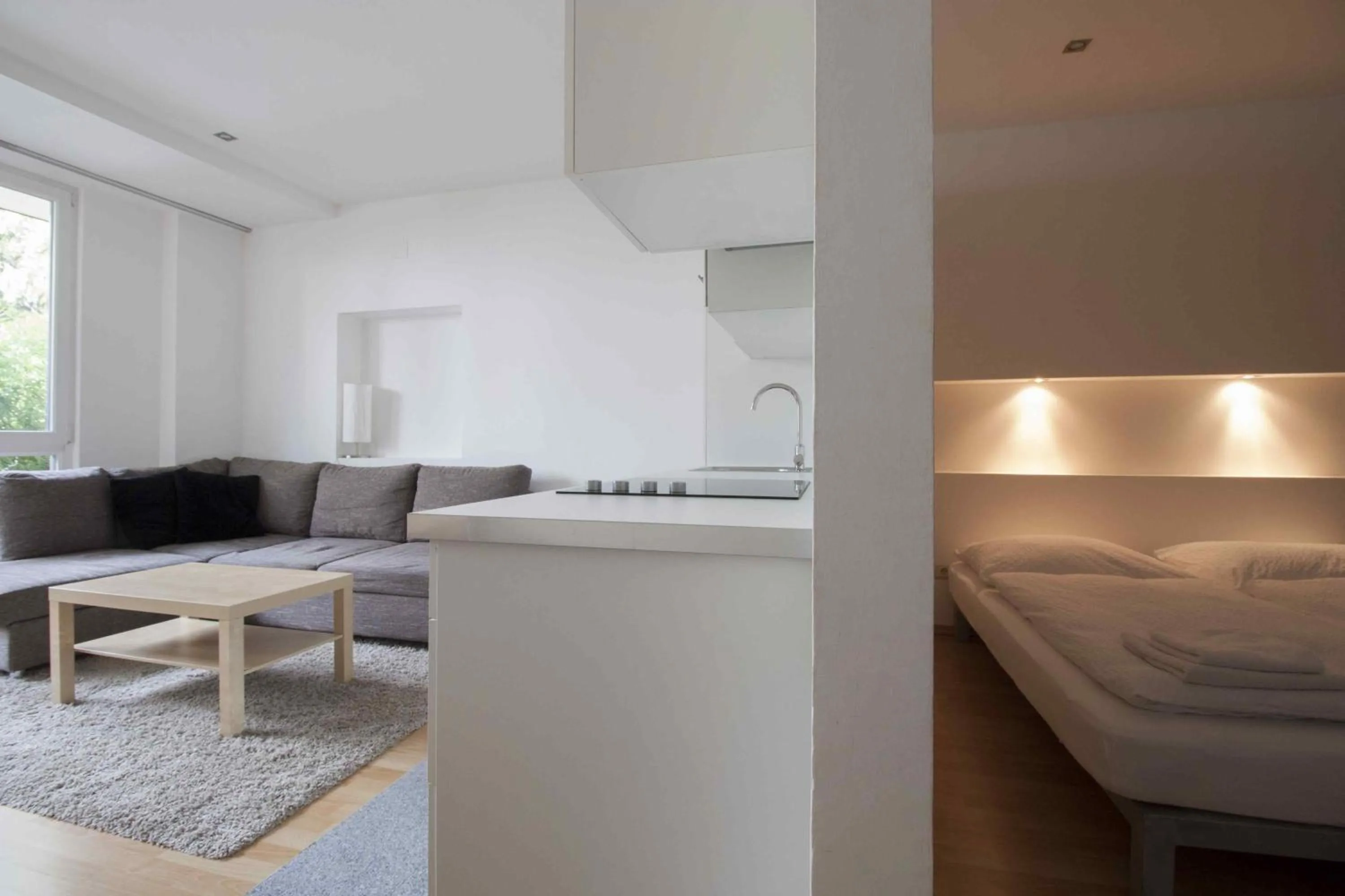 Living room, Bed in Appartements Christophorus