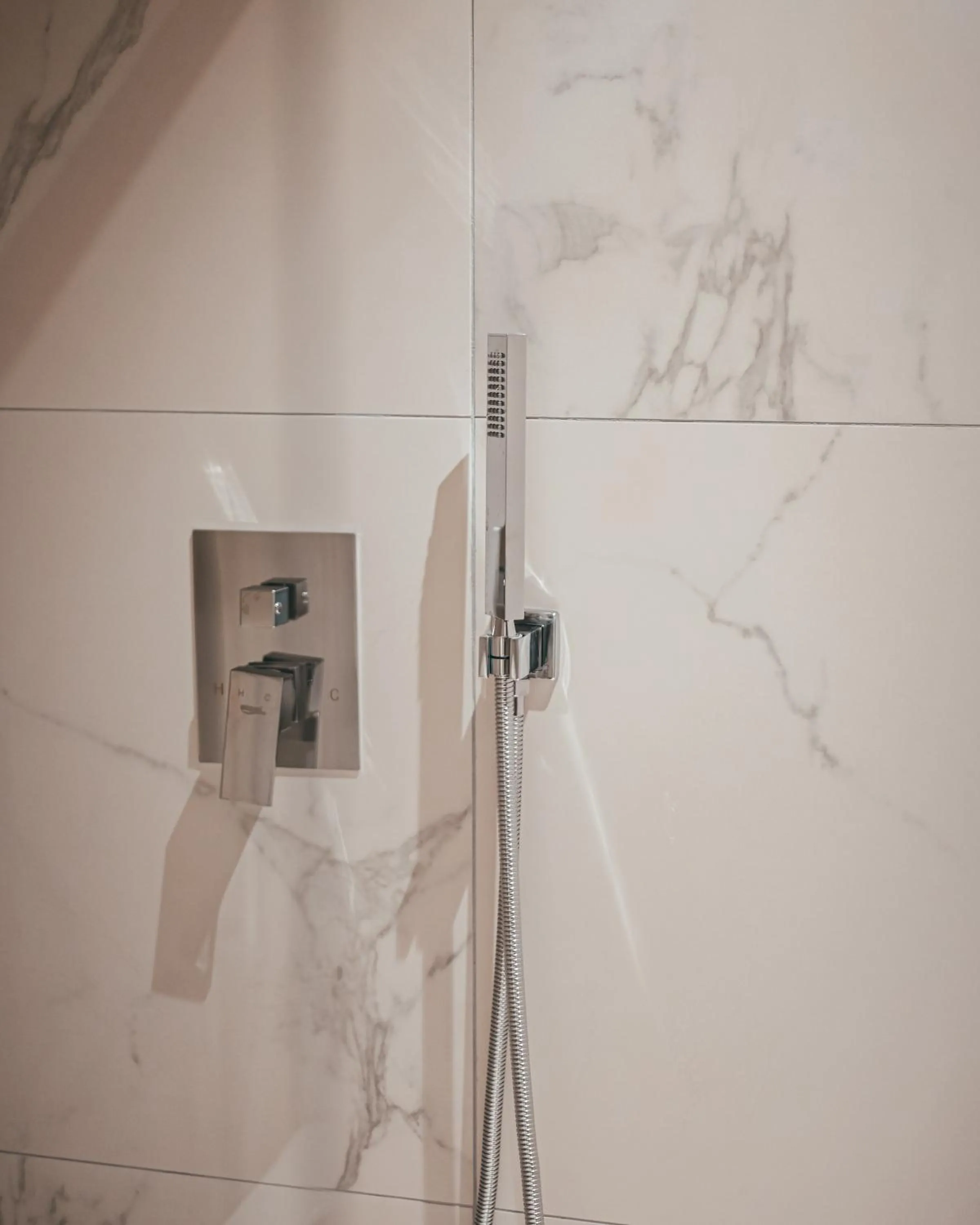 Shower in Monun Hotel