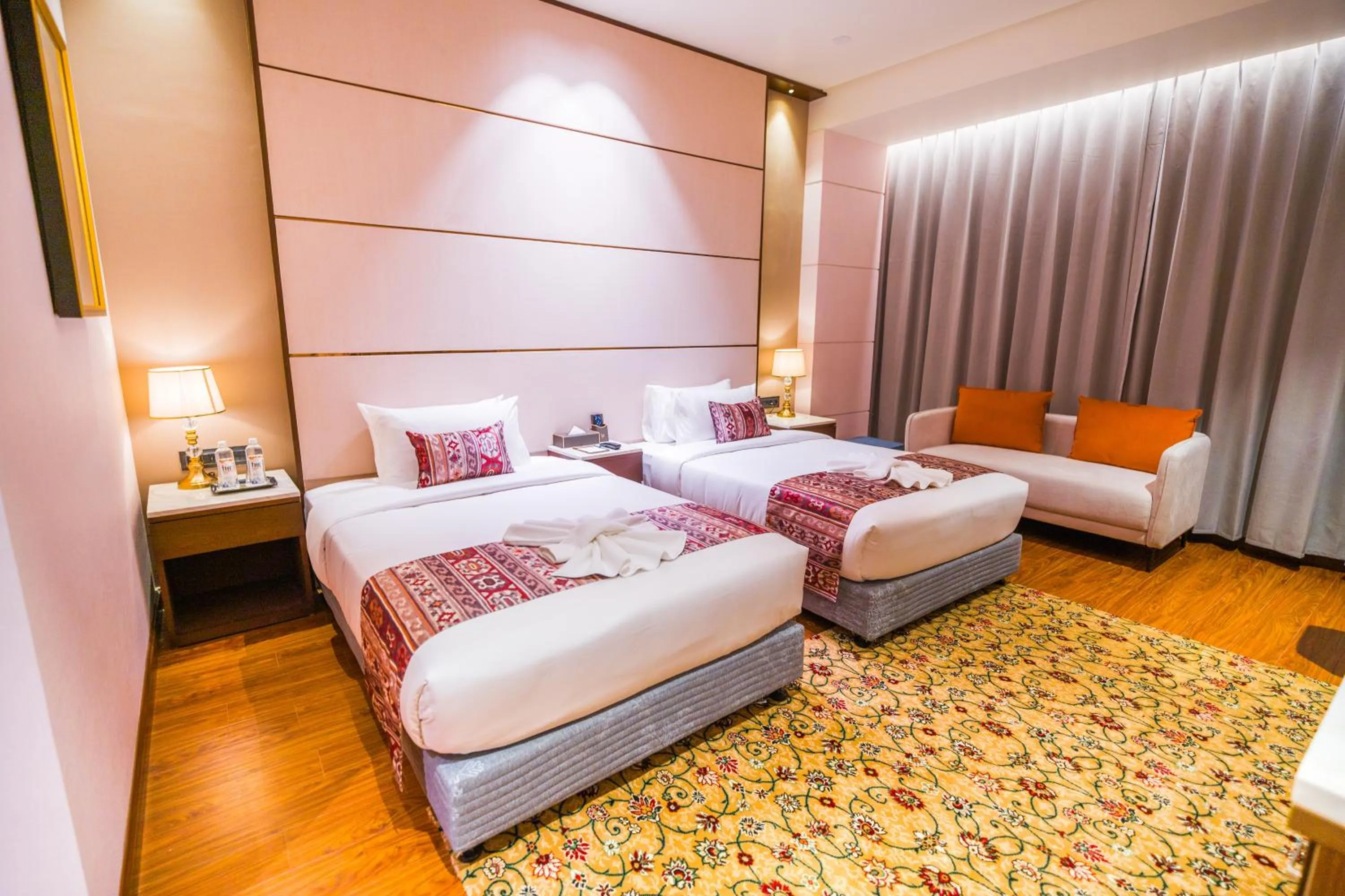 Bed in The Maple Hotel