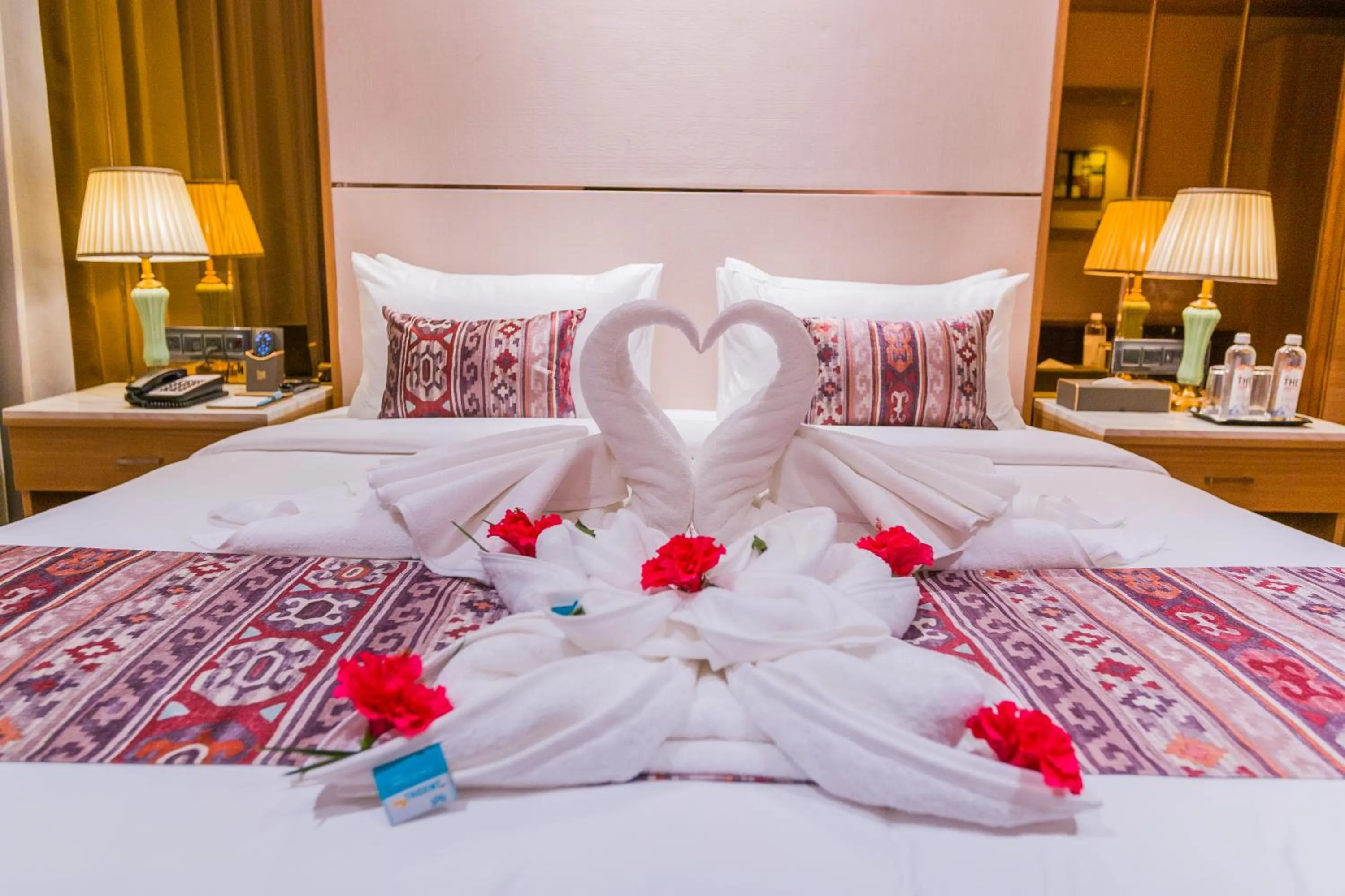 Bed in The Maple Hotel