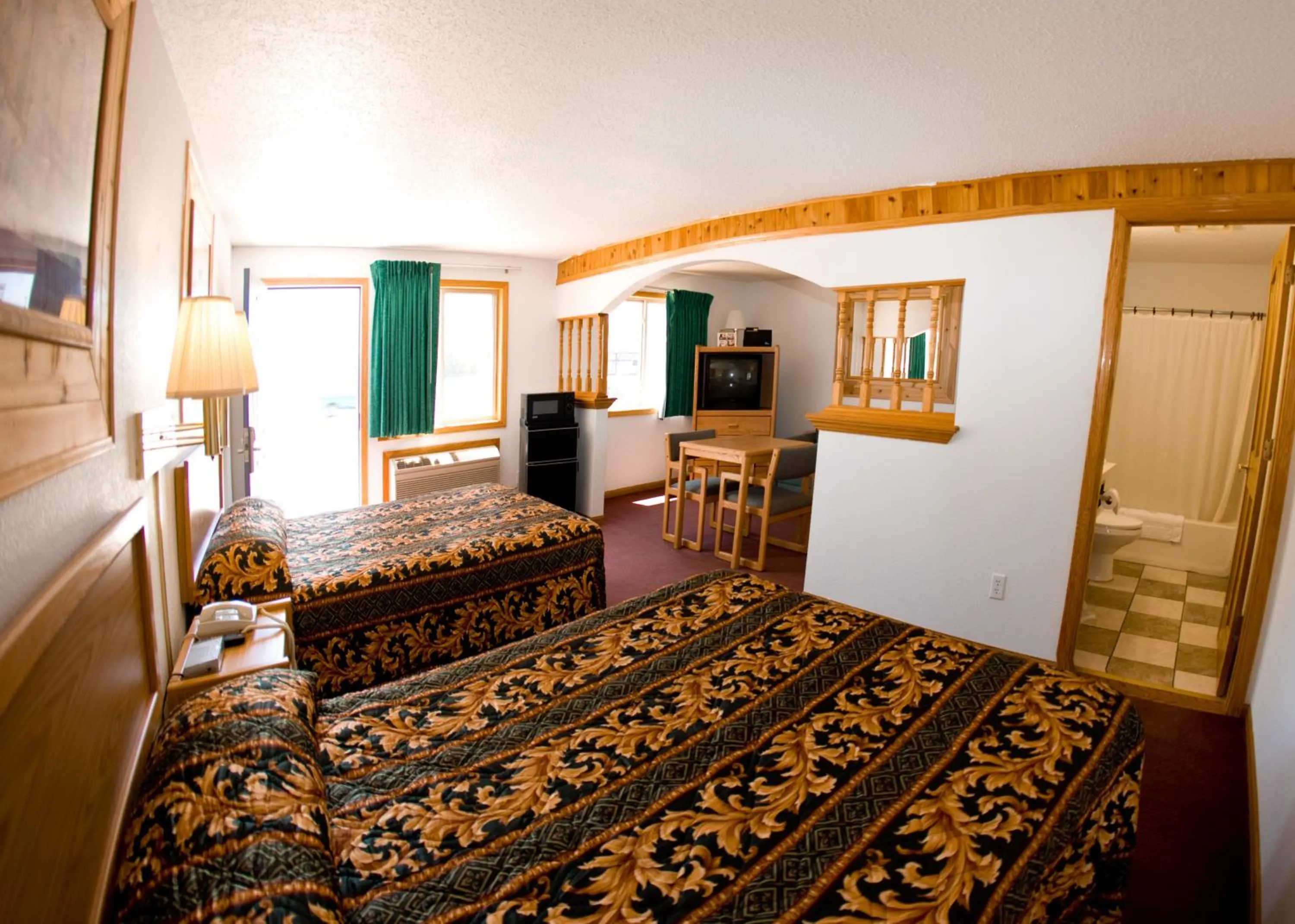 Photo of the whole room, Bed in North Country Inn & Suites