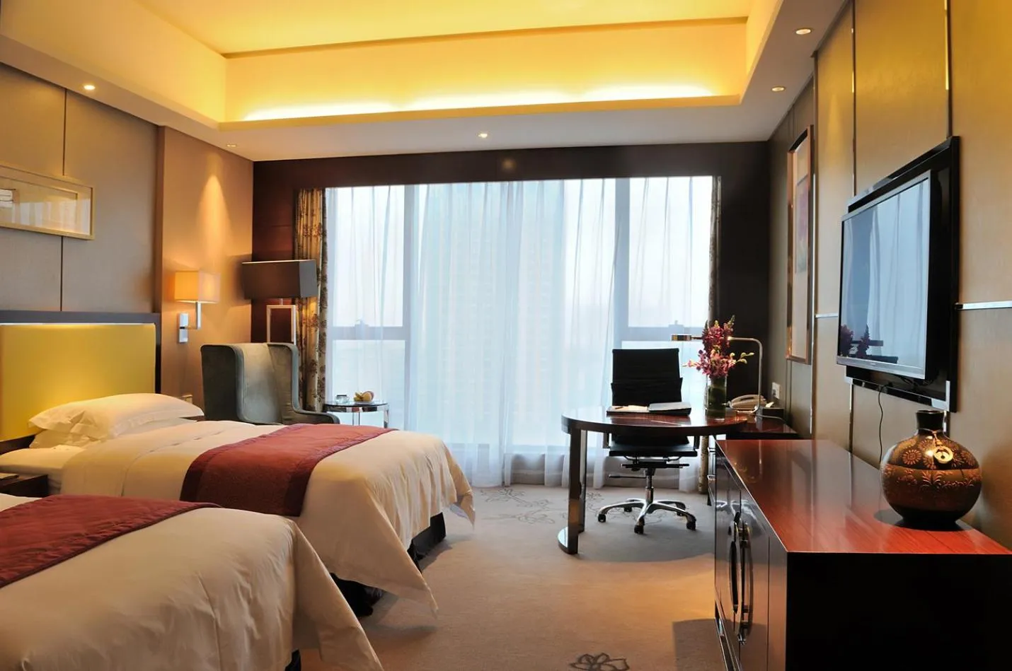 Bed in Guangzhou ChangFeng Gloria Plaza Hotel