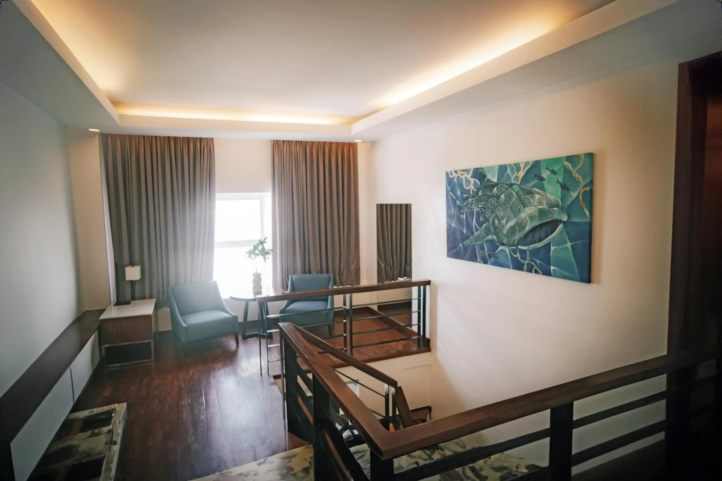 TV and multimedia in The Harvest Hotel Managed by HII