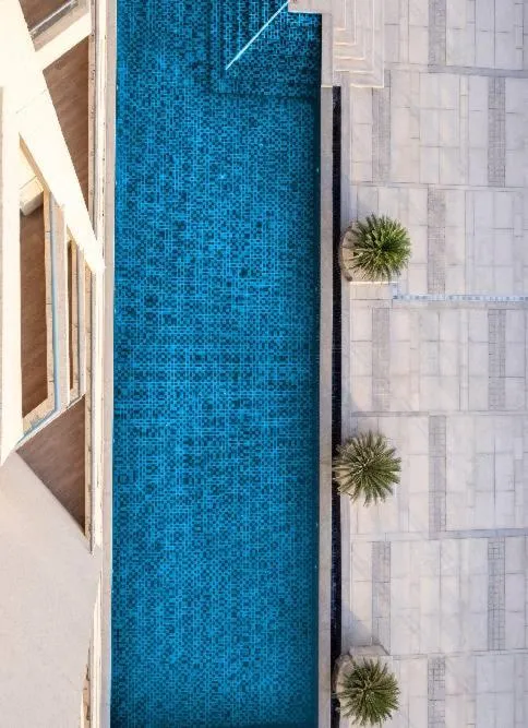 Swimming pool in Alivaa Hotel Gurugram Sohna Road City Center