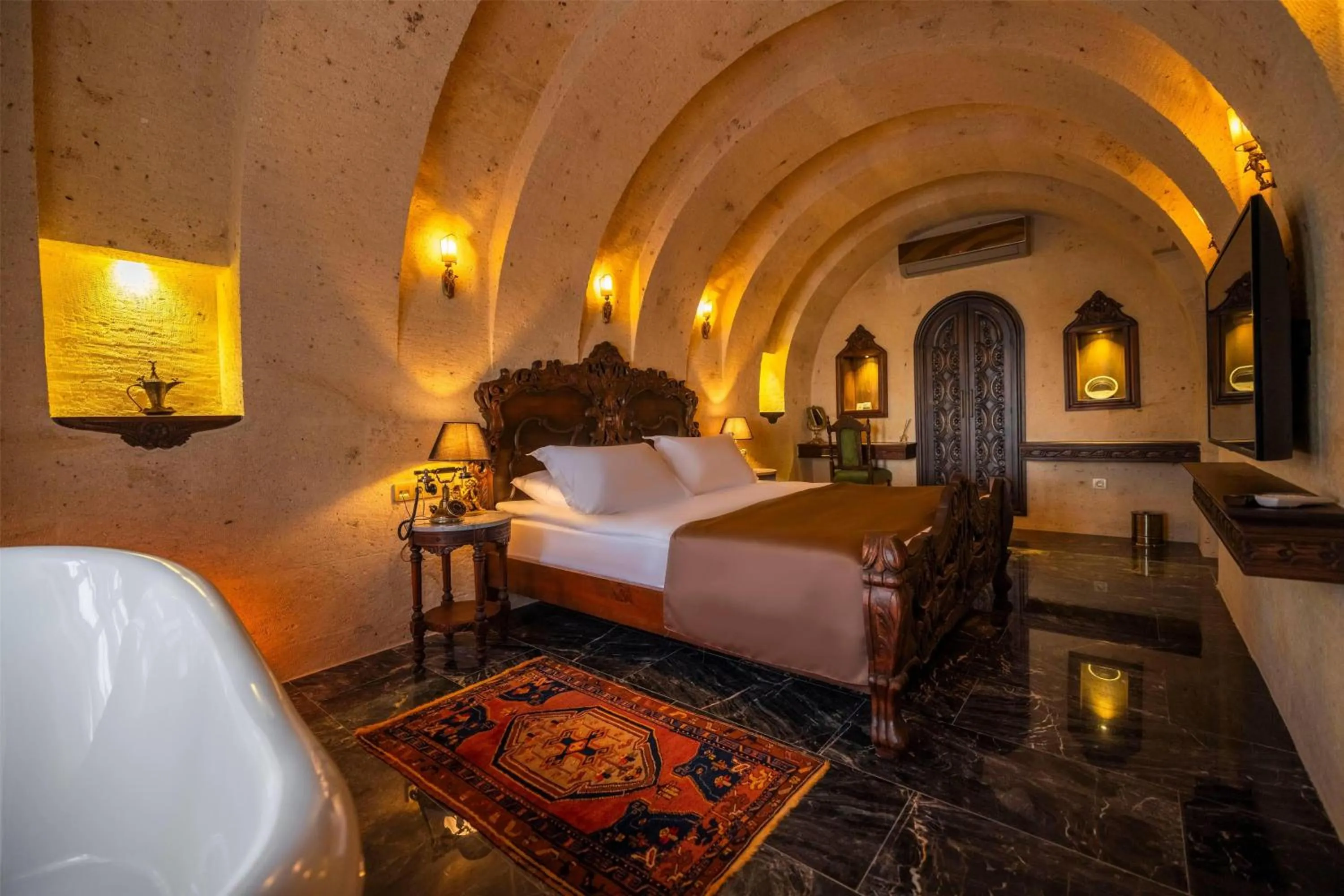 Photo of the whole room, Bed in Signature Cave Cappadocia, Trademark Collection by Wyndham