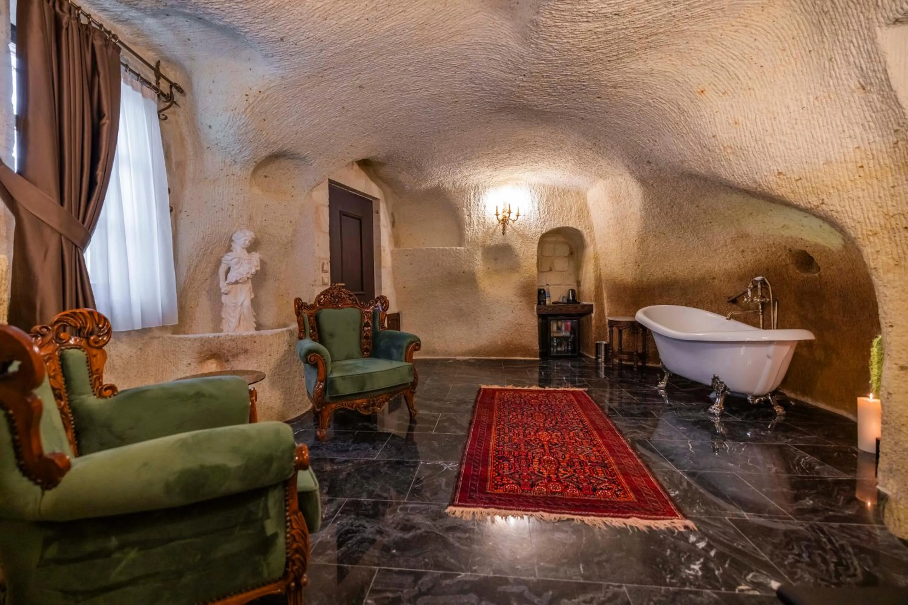 Seating area in Signature Cave Cappadocia, Trademark Collection by Wyndham