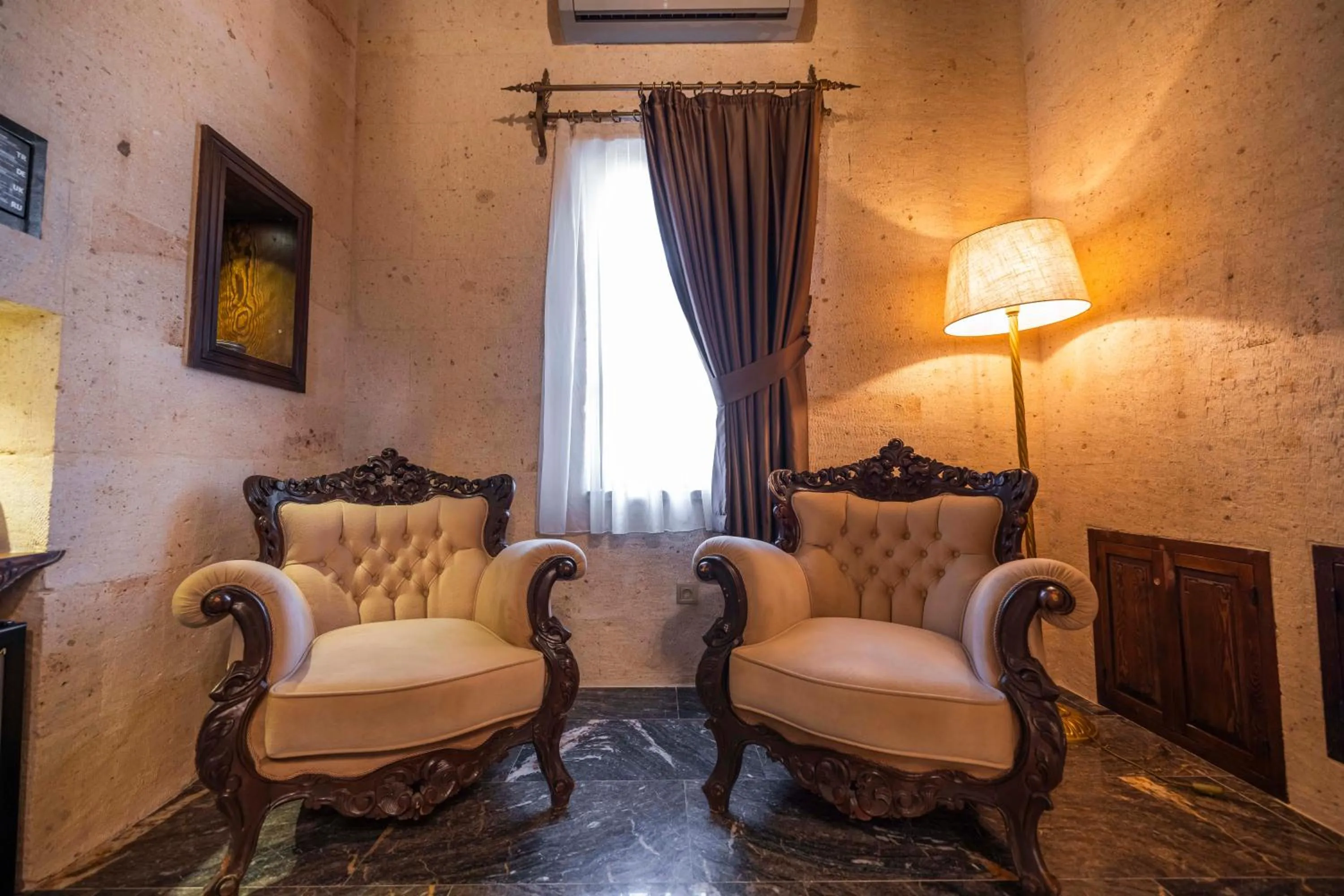 Seating area in Signature Cave Cappadocia, Trademark Collection by Wyndham