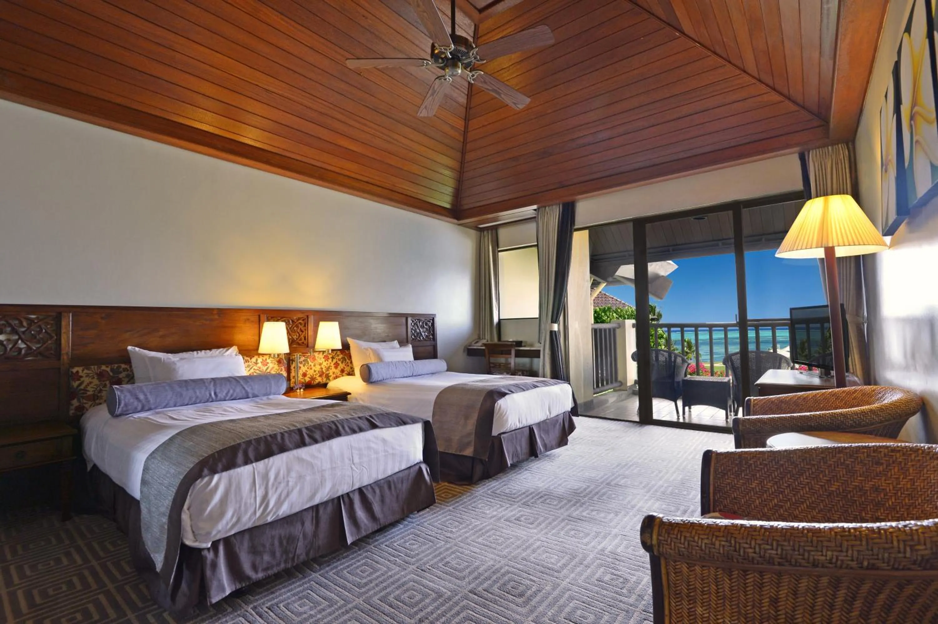 Bed in Aqua Resort Club Saipan