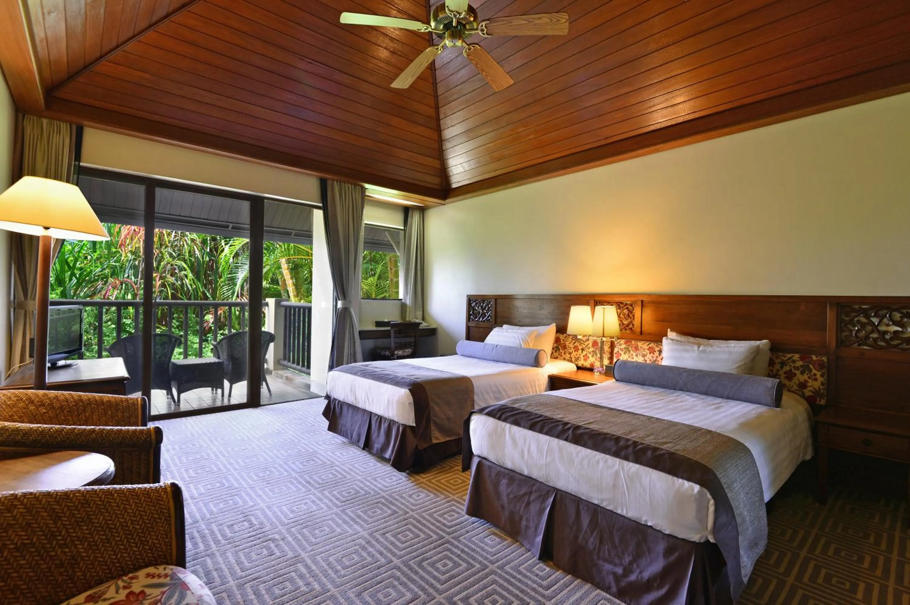Bed in Aqua Resort Club Saipan
