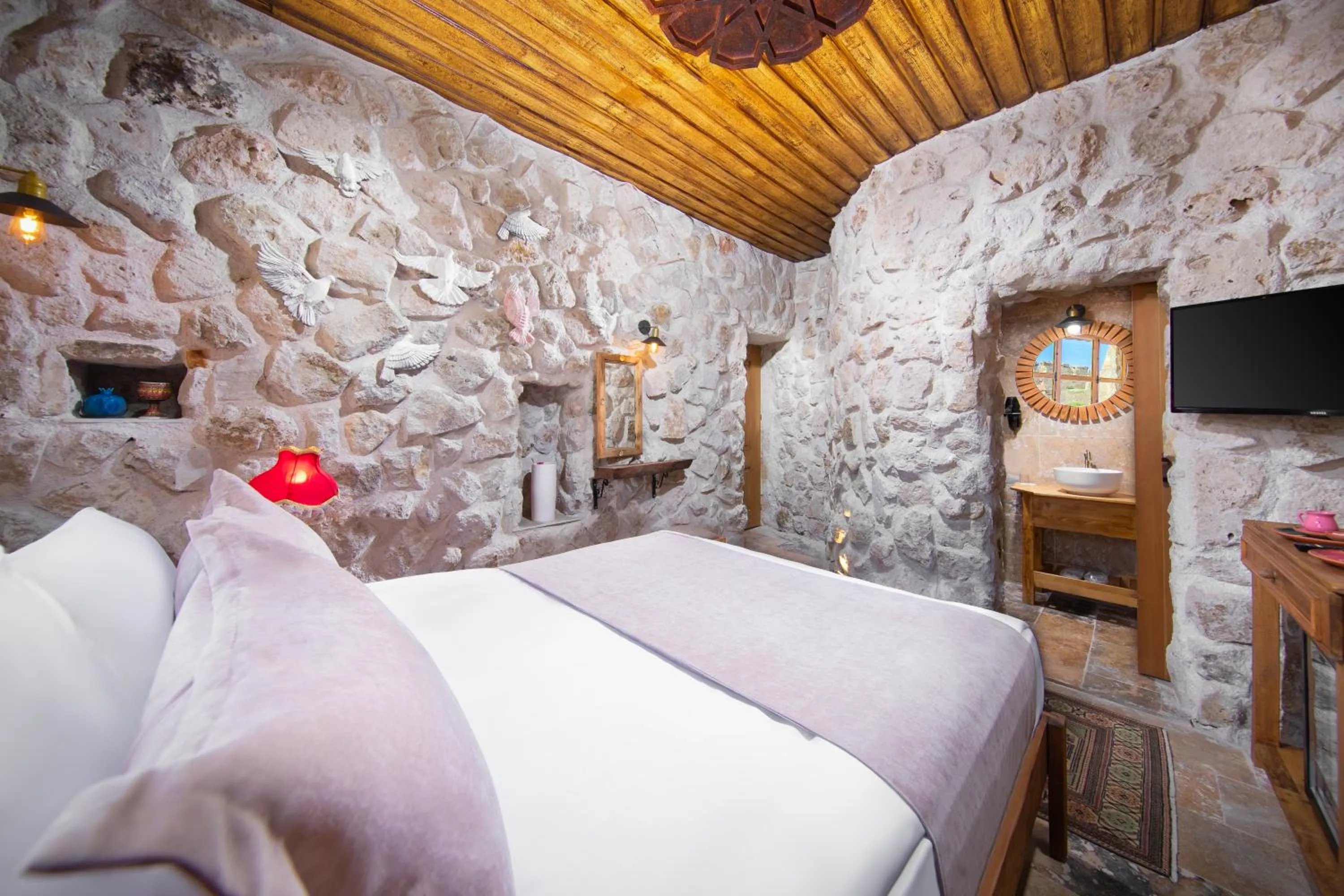 Bed in Cappadocia Cavusin Stone House