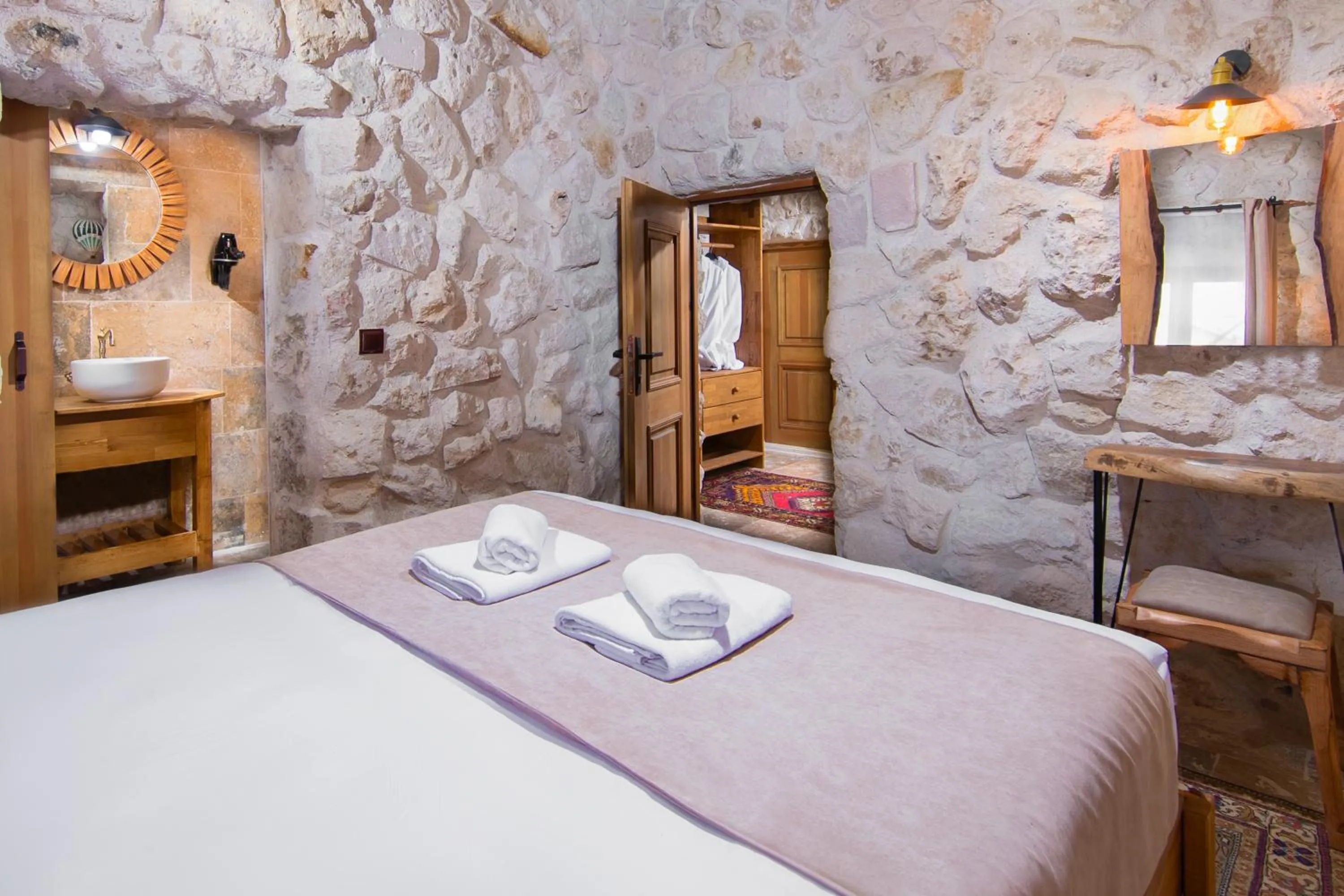 Bed in Cappadocia Cavusin Stone House